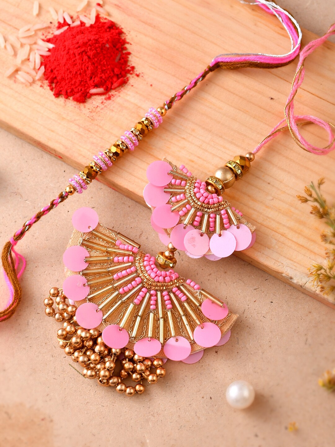 Aapno Rajasthan Set Of 2 Stone-Studded & Beaded Rakhi With Roli Chawal & Greeting Card, Gold
Aapno Rajasthan Set Of 2 Stone-Studded & Beaded Rakhi With Roli Chawal & Greeting Card, Gold