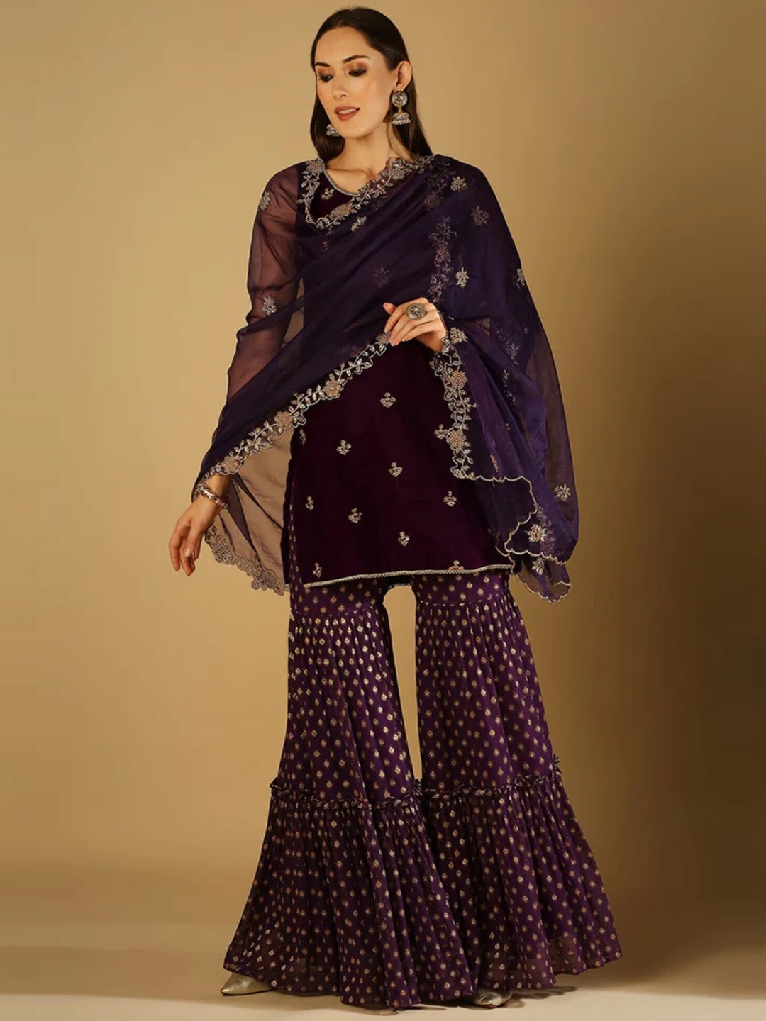 Monk & Mei Ethnic Motifs Embroidered Thread Work Velvet Kurti With Sharara & Dupatta, Purple
Monk & Mei Ethnic Motifs Embroidered Thread Work Velvet Kurti With Sharara & Dupatta, Purple