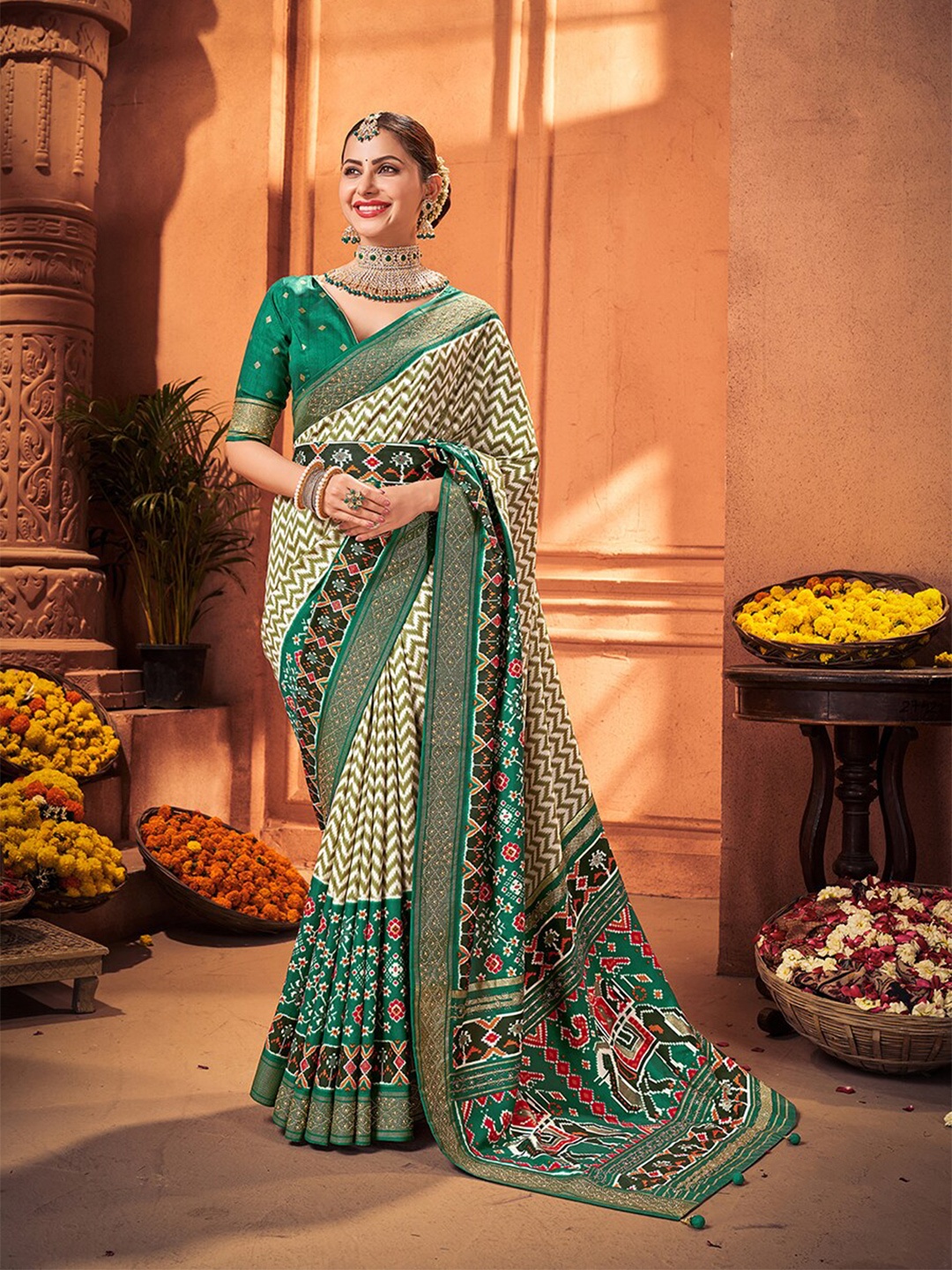 Mitera Geometric Printed Beads and Stones Embellished Silk Cotton Patola Saree, Off white
Mitera Geometric Printed Beads and Stones Embellished Silk Cotton Patola Saree, Off white