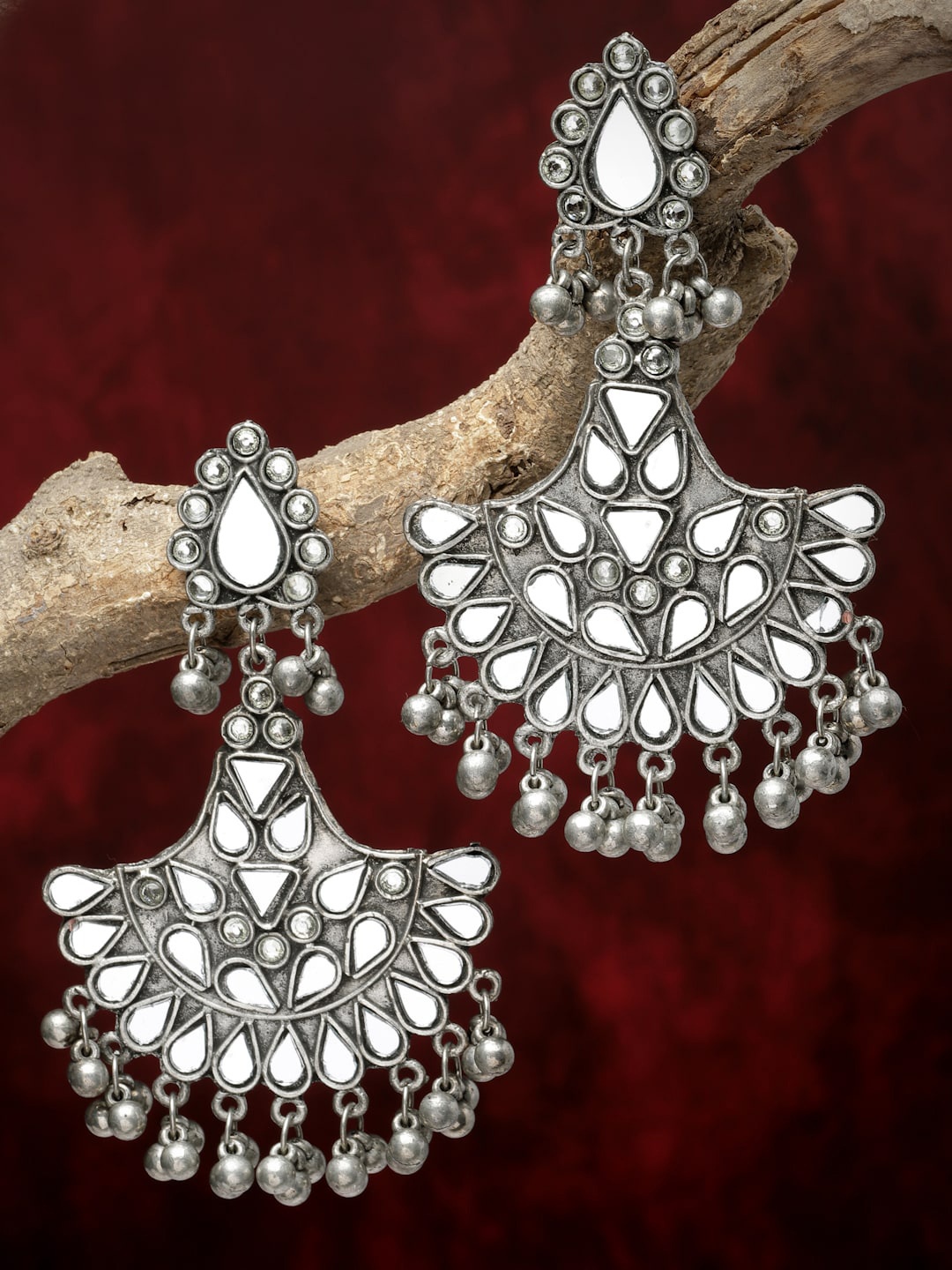 Moedbuille Silver-Plated Crystals Studded Oxidised Crescent Shaped Drop Earrings
Moedbuille Silver-Plated Crystals Studded Oxidised Crescent Shaped Drop Earrings