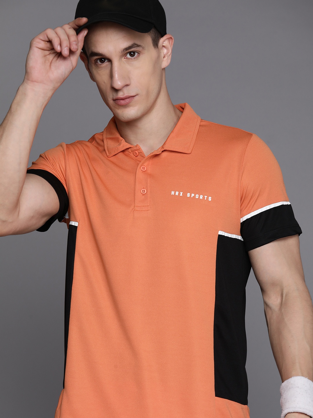 HRX by Hrithik Roshan Colourblocked Rapid-Dry Racket Sport Polo Collar T-shirt, Orange
HRX by Hrithik Roshan Colourblocked Rapid-Dry Racket Sport Polo Collar T-shirt, Orange