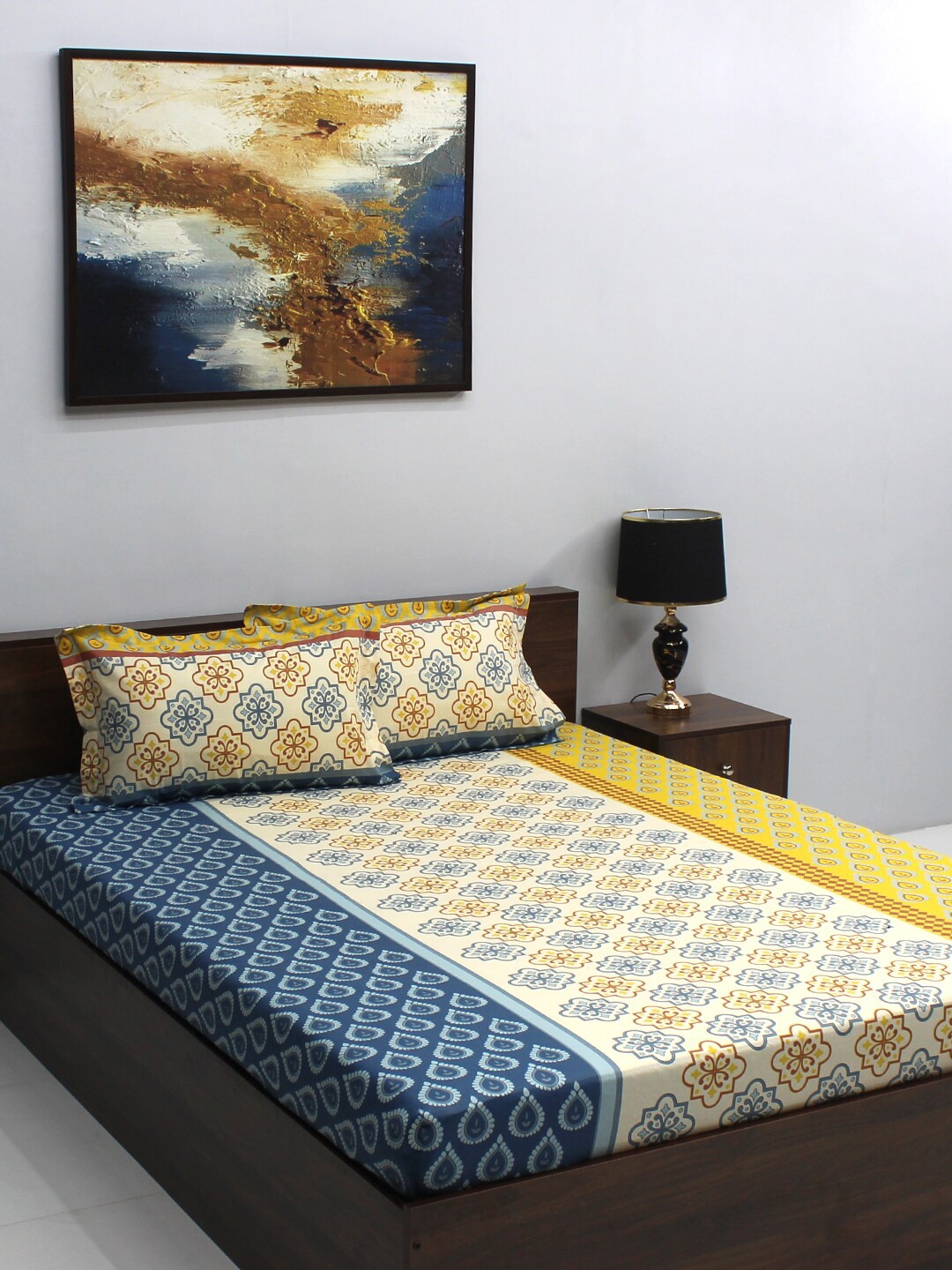 BOMBAY DYEING Cream-Coloured & Blue Ethnic Motifs 110 TC Queen Bedsheet with 2 Pillow Covers
BOMBAY DYEING Cream-Coloured & Blue Ethnic Motifs 110 TC Queen Bedsheet with 2 Pillow Covers
