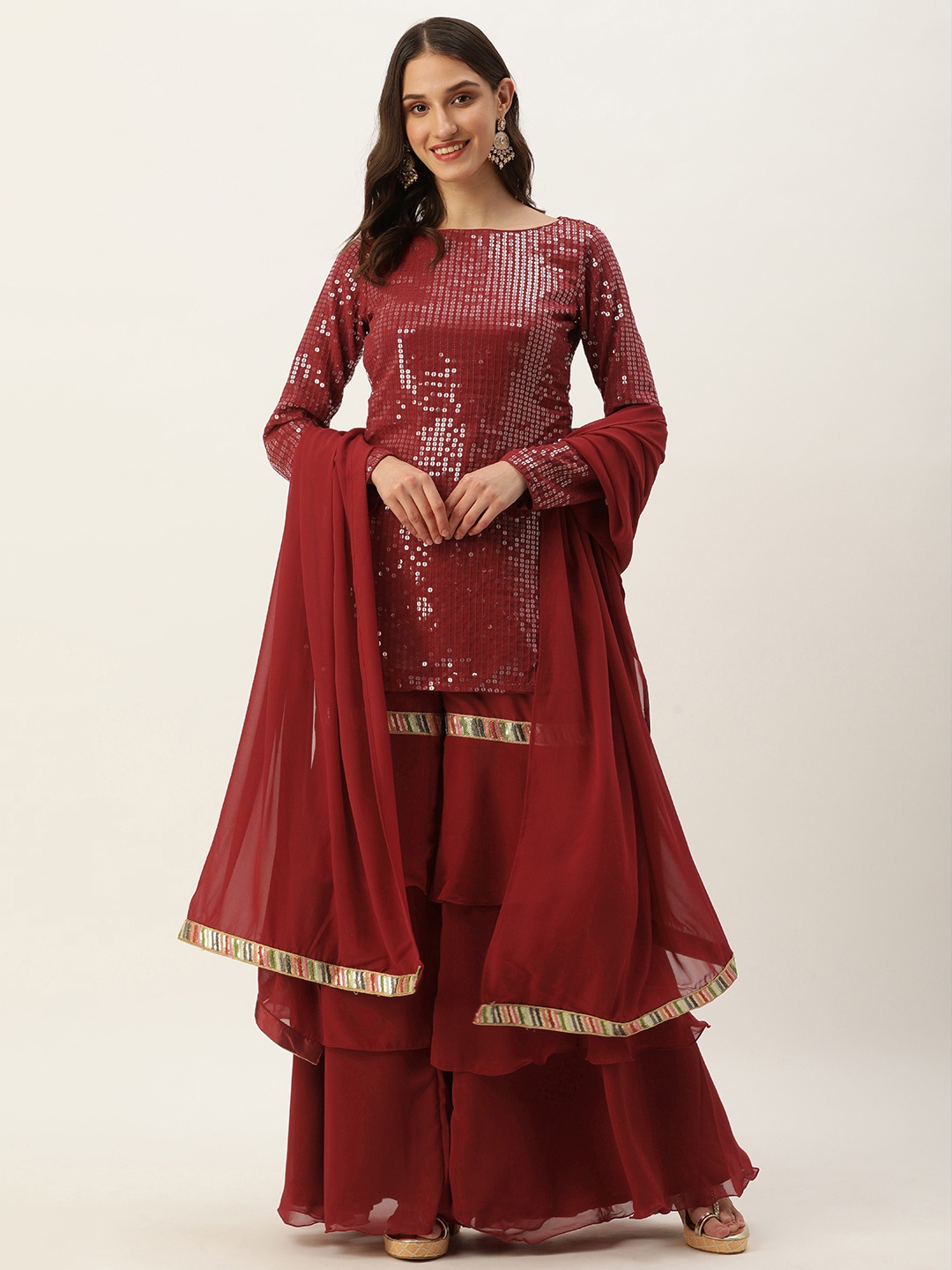 Ethnovog Women Embroidered Regular Sequinned Kurti with Sharara & With Dupatta, Maroon
Ethnovog Women Embroidered Regular Sequinned Kurti with Sharara & With Dupatta, Maroon