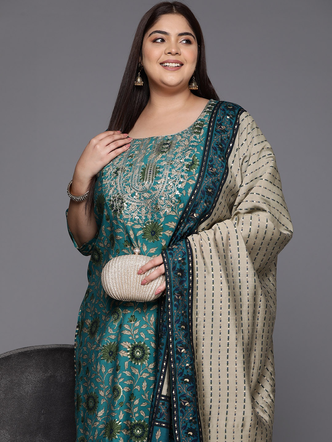 EXTRA LOVE BY LIBAS Plus Size Floral Yoke Design Sequinned Kurta with Palazzos & Dupatta, Teal
EXTRA LOVE BY LIBAS Plus Size Floral Yoke Design Sequinned Kurta with Palazzos & Dupatta, Teal
