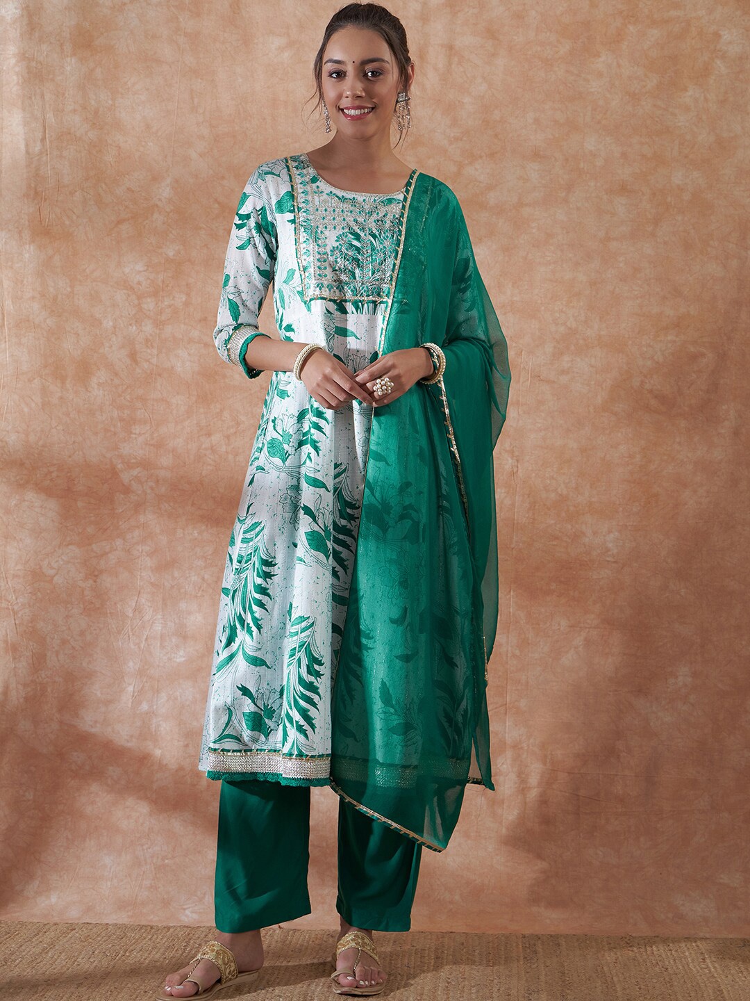 InWeave White & Green Floral Printed Thread Work A- Line Kurta & Trousers with Dupatta
InWeave White & Green Floral Printed Thread Work A- Line Kurta & Trousers with Dupatta