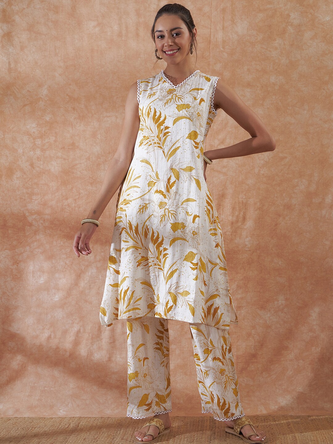 Sangria White & Mustard Floral Printed V-Neck Lace Detailed A-Line Kurta with Trousers
Sangria White & Mustard Floral Printed V-Neck Lace Detailed A-Line Kurta with Trousers