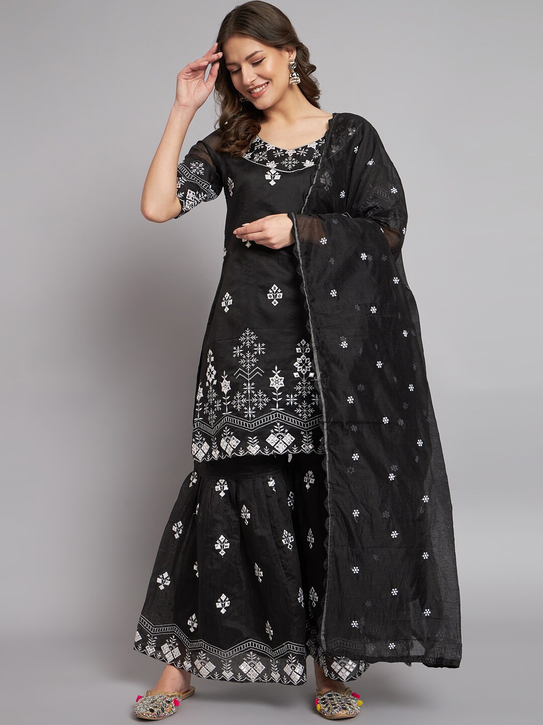 BLACK SCISSOR Floral Embroidered Mirror Work Chanderi Cotton Kurta With Sharara & Dupatta
BLACK SCISSOR Floral Embroidered Mirror Work Chanderi Cotton Kurta With Sharara & Dupatta