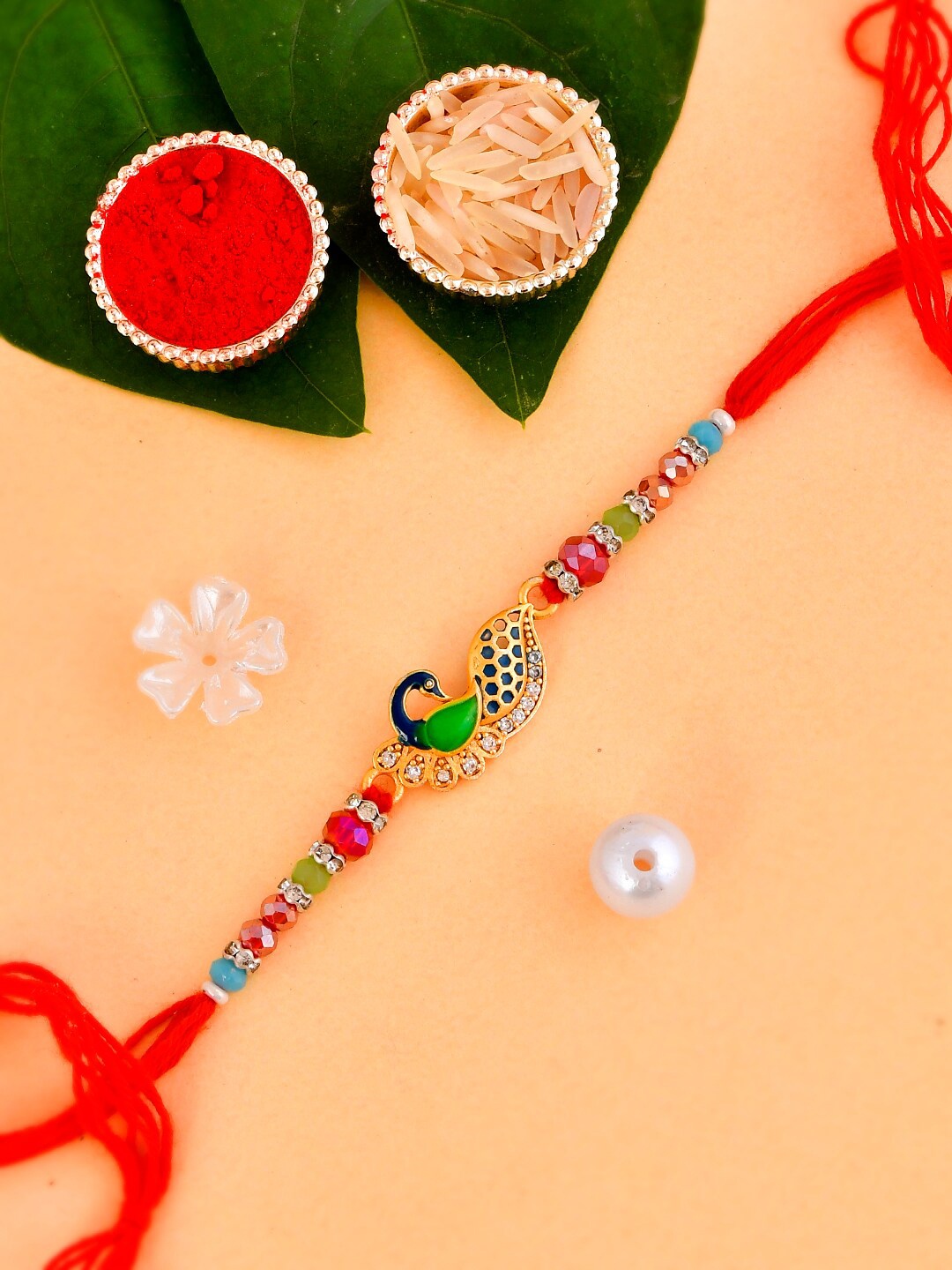 Aapno Rajasthan Unisex Peacock Charm-Studded Thread Rakhi With Roli Chawal & Greeting Card, Red
Aapno Rajasthan Unisex Peacock Charm-Studded Thread Rakhi With Roli Chawal & Greeting Card, Red