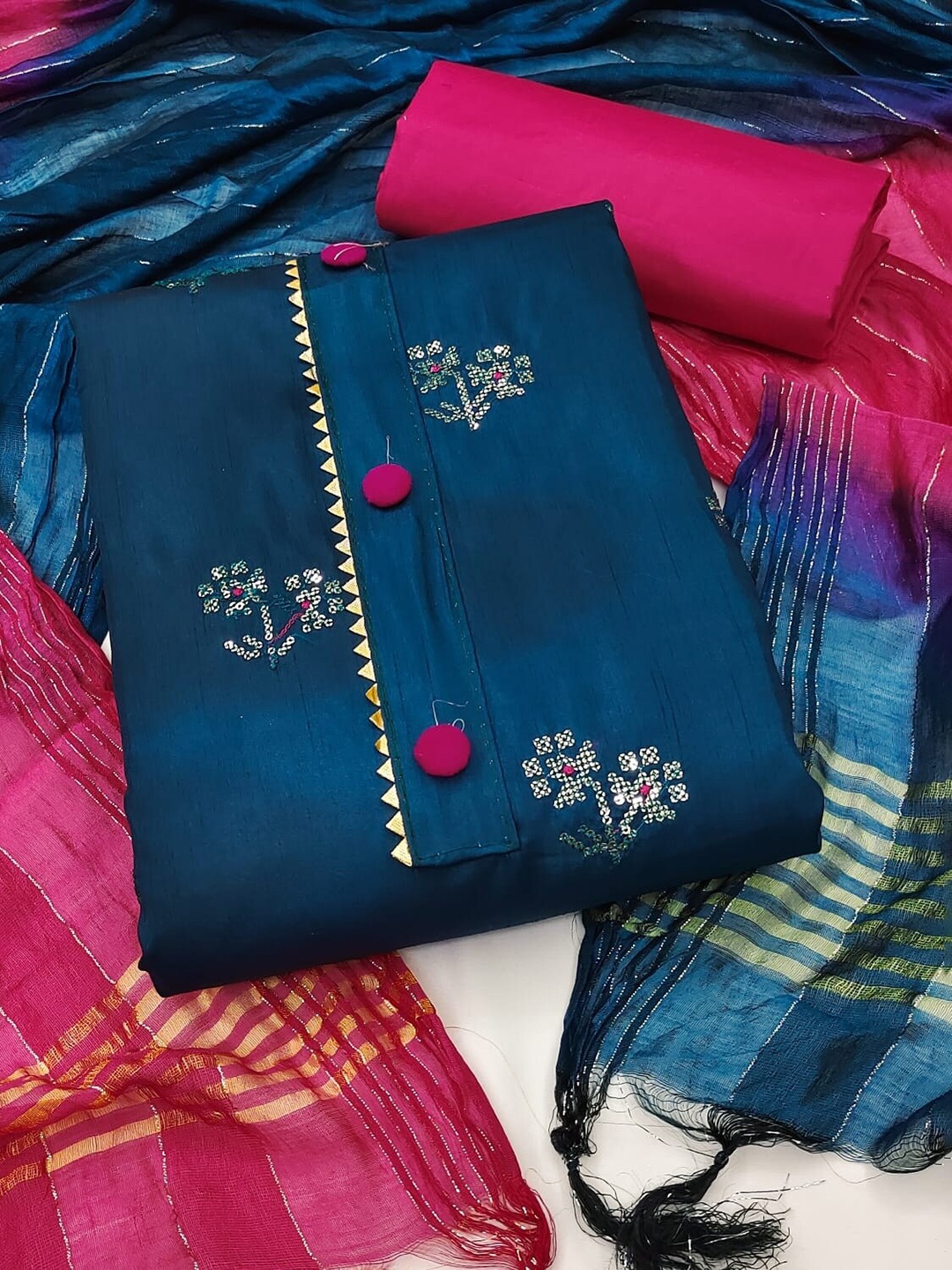 APNISHA Floral Embroidered & Gotta Patti Silk Georgette Unstitched Dress Material, Blue
APNISHA Floral Embroidered & Gotta Patti Silk Georgette Unstitched Dress Material, Blue