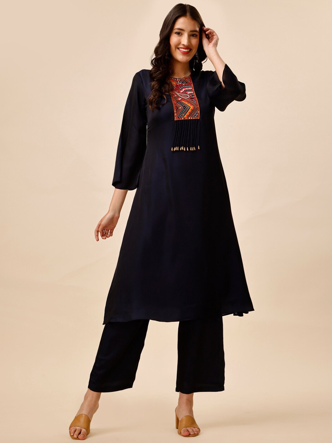 Inddus Women Navy Blue Ethnic Motifs Yoke Design Regular Thread Work Kurta with Trousers
Inddus Women Navy Blue Ethnic Motifs Yoke Design Regular Thread Work Kurta with Trousers