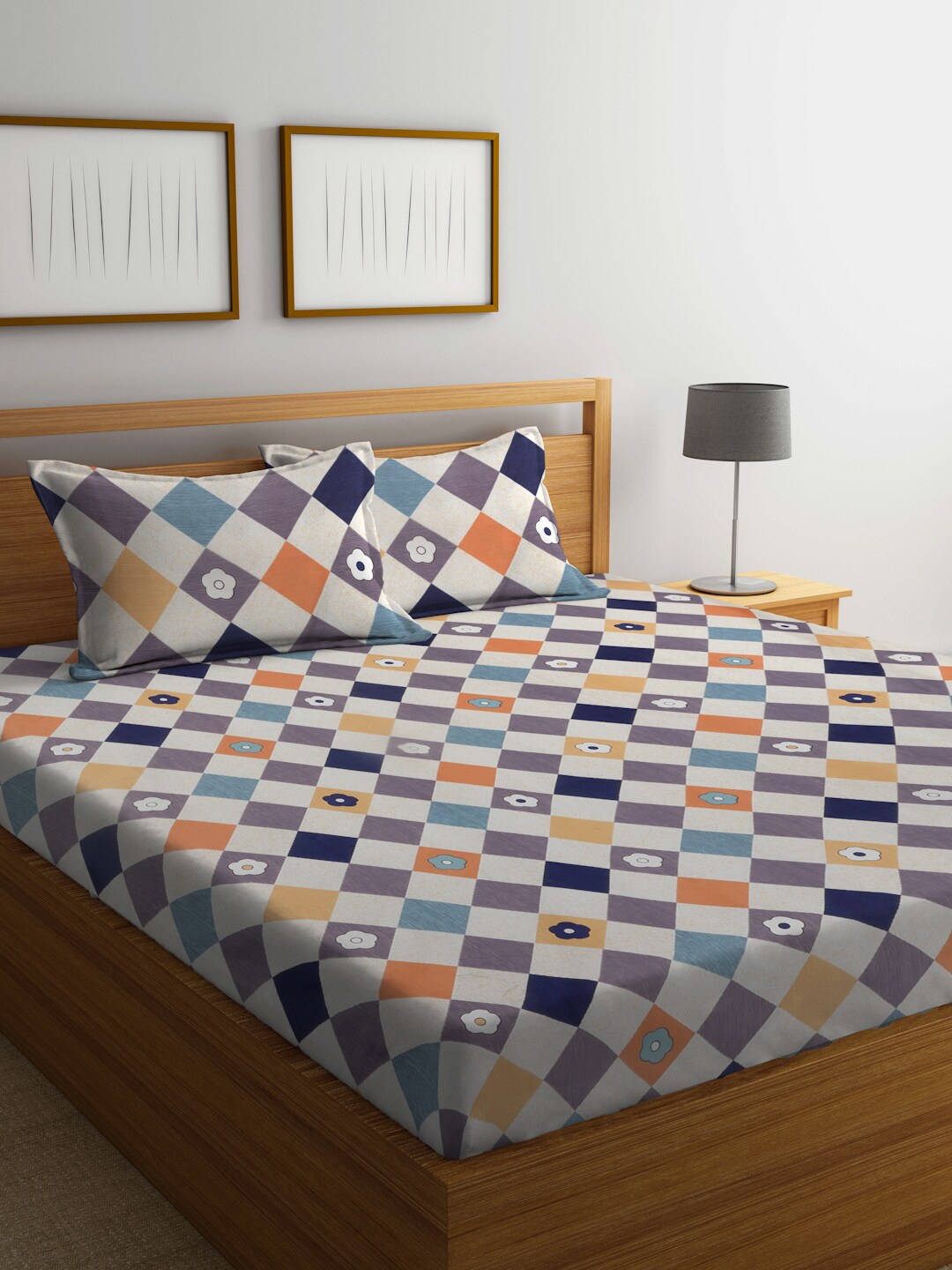 Arrabi White & Purple Floral Printed 300 TC King Bedsheet With 2 Pillow Covers
Arrabi White & Purple Floral Printed 300 TC King Bedsheet With 2 Pillow Covers