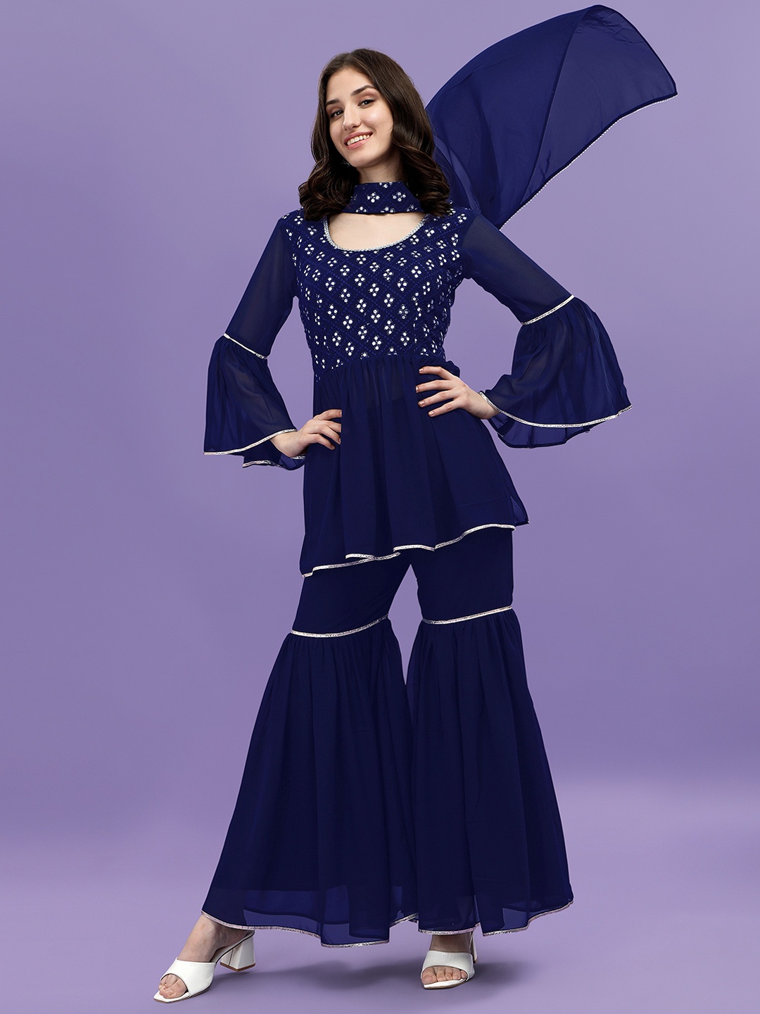 KALINI Ethnic Motifs Yoke Design Empire Mirror Work Kurti with Sharara & With Dupatta, Navy blue
KALINI Ethnic Motifs Yoke Design Empire Mirror Work Kurti with Sharara & With Dupatta, Navy blue