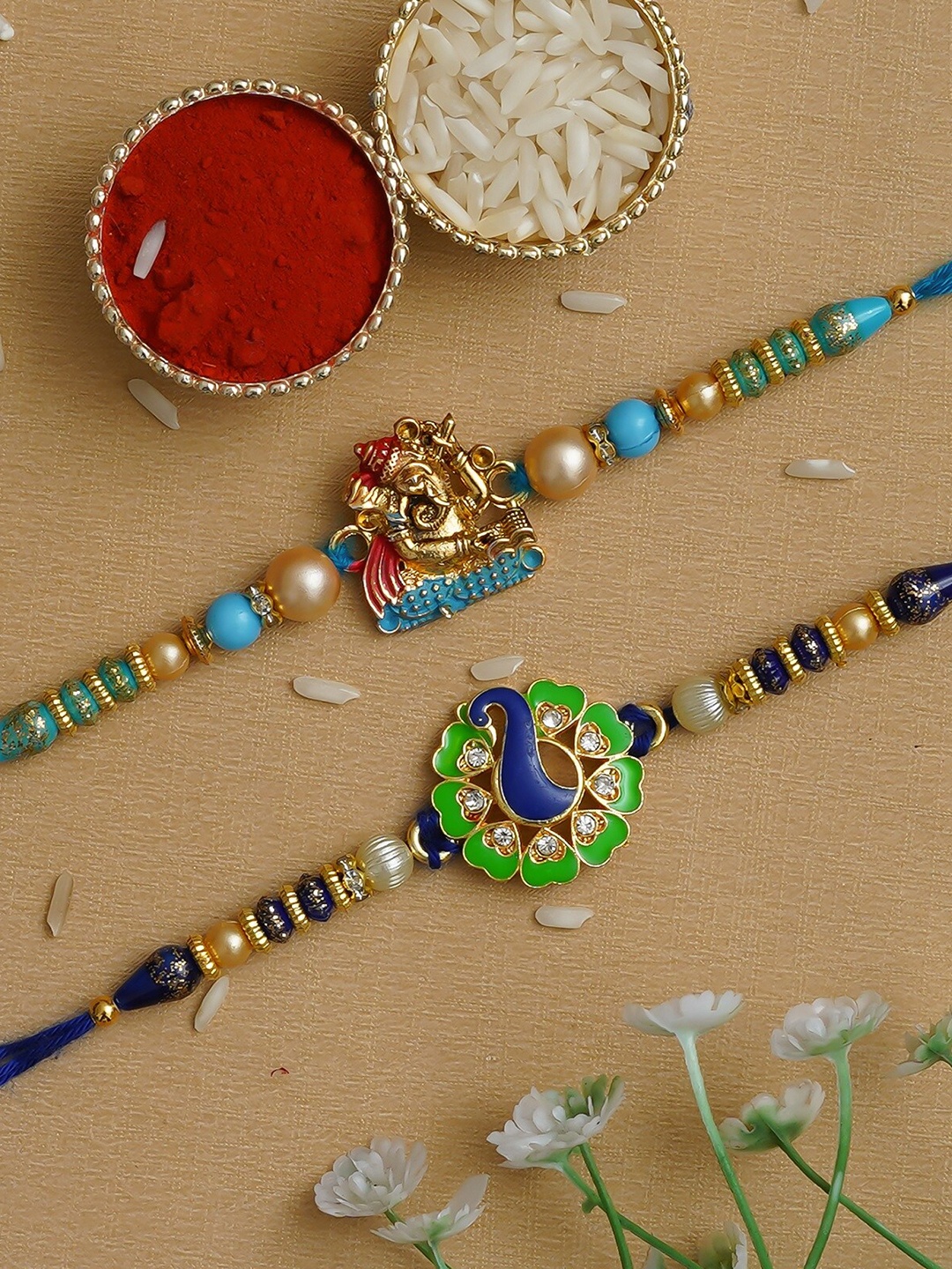 Fashion Bizz Unisex Set of 2 Ganesha & Peacock Charm Beaded Rakhis With Roli & Chawal, Blue
Fashion Bizz Unisex Set of 2 Ganesha & Peacock Charm Beaded Rakhis With Roli & Chawal, Blue