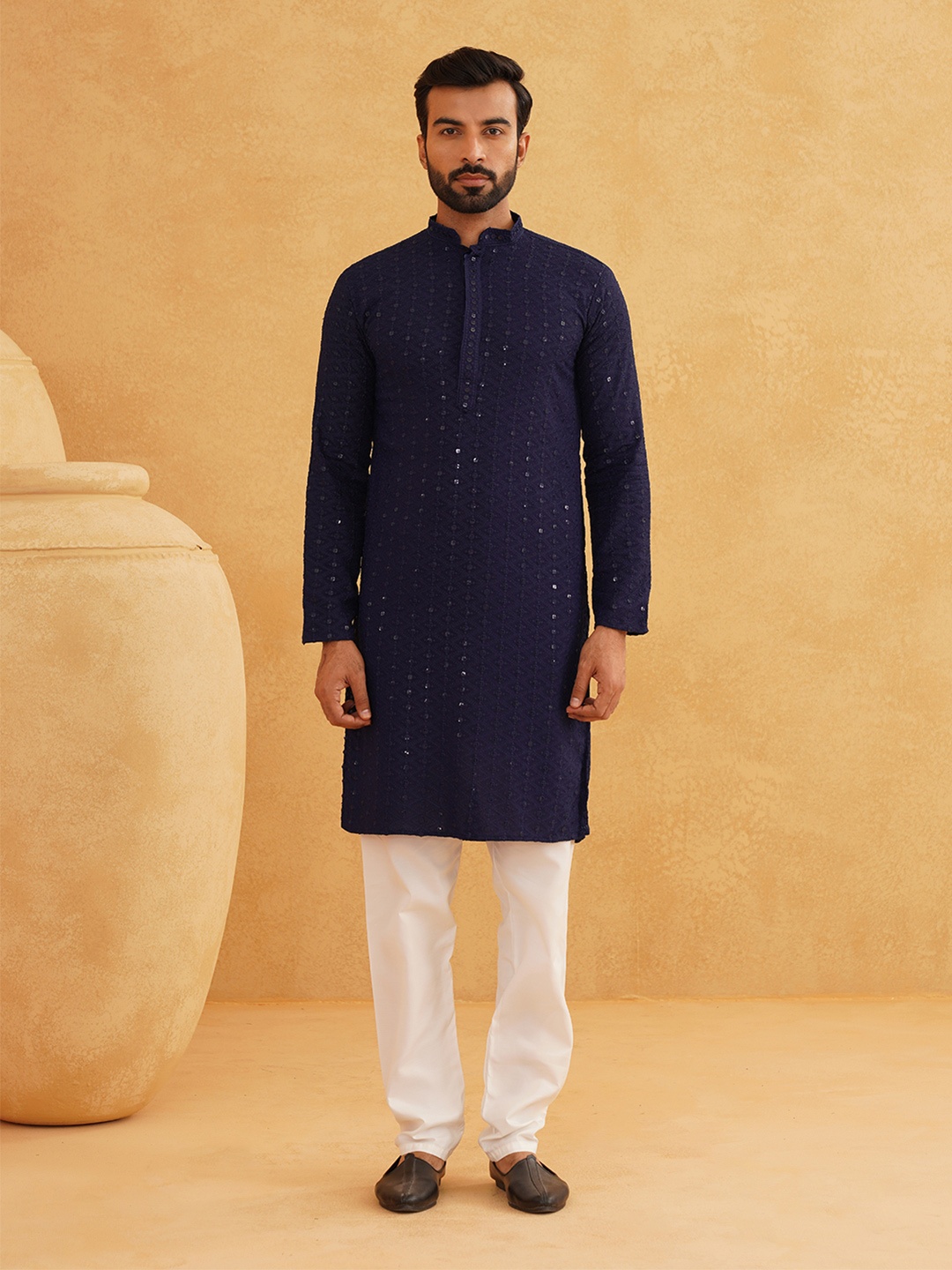 SOJANYA Ethnic Motifs Embroidered Sequinned Pure Cotton Kurta With Churidar, Navy blue
SOJANYA Ethnic Motifs Embroidered Sequinned Pure Cotton Kurta With Churidar, Navy blue