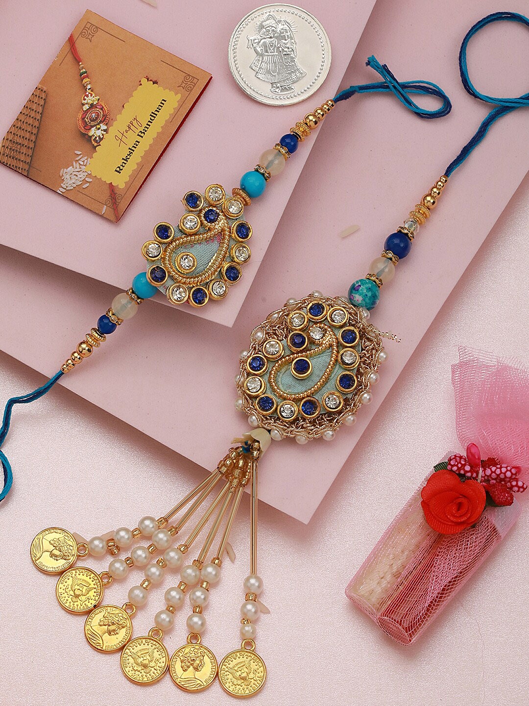 Saraf RS Jewellery Set Of 2 Stones Studded & Beaded Rakhis With Roli Chawal & Silver Coin, Blue
Saraf RS Jewellery Set Of 2 Stones Studded & Beaded Rakhis With Roli Chawal & Silver Coin, Blue