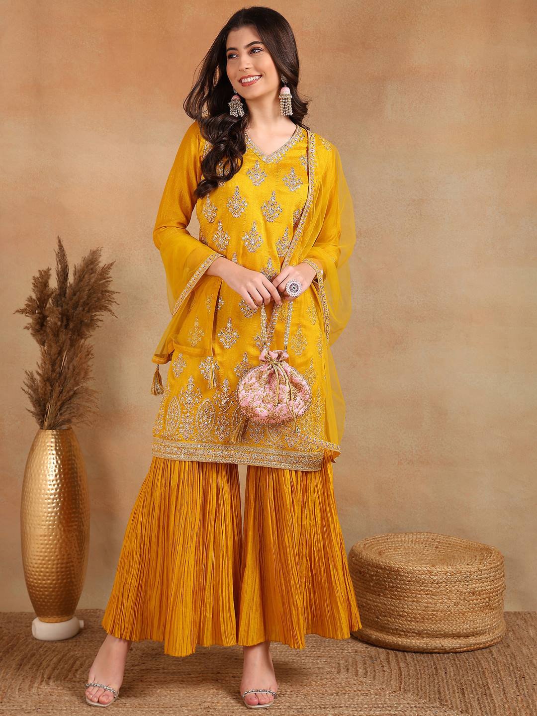 AHIKA Mustard Yellow Ethnic Motifs Embroidered Sequinned Kurta With Sharara & Dupatta
AHIKA Mustard Yellow Ethnic Motifs Embroidered Sequinned Kurta With Sharara & Dupatta