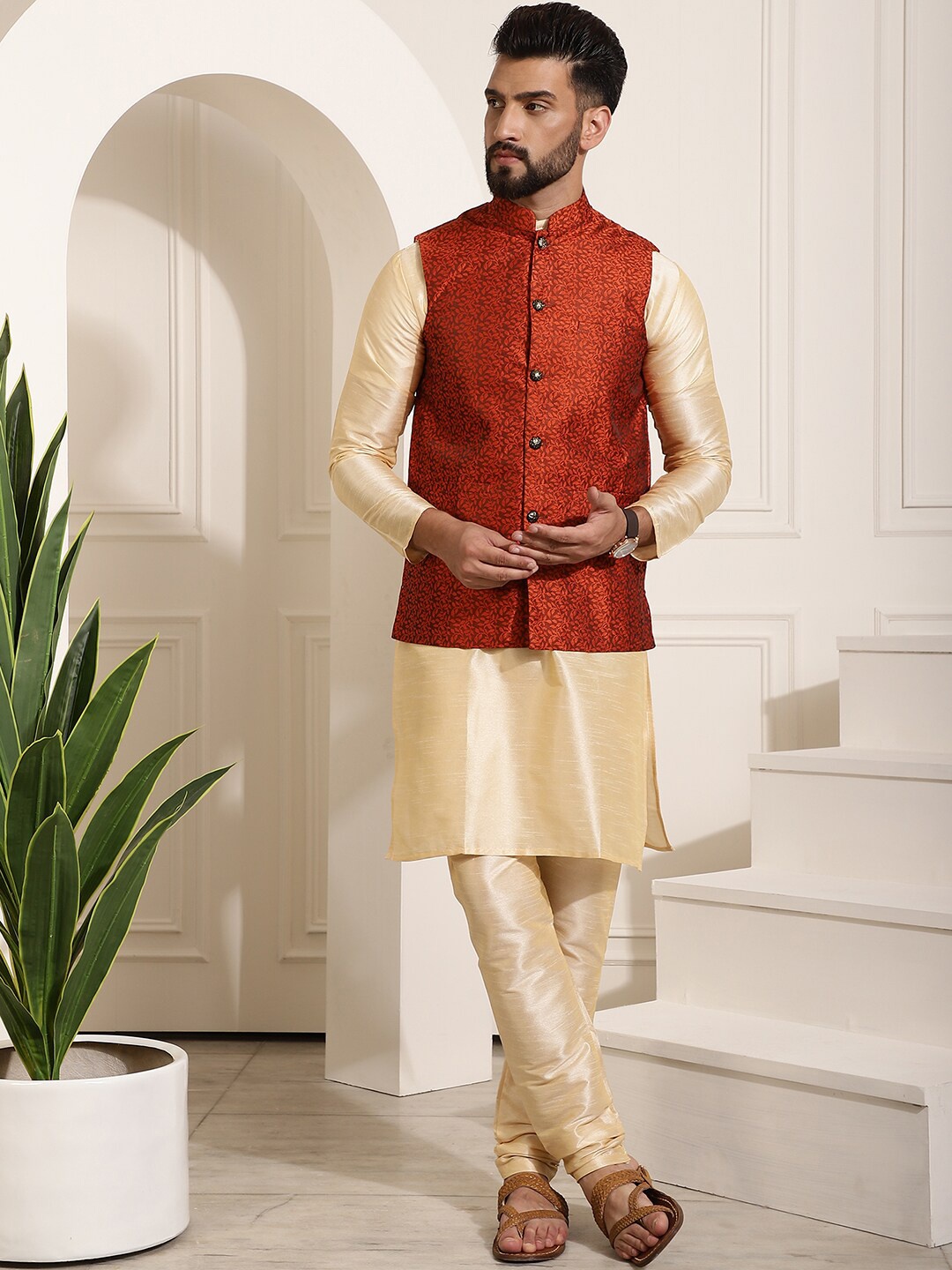SOJANYA Mandarin Collar Regular Kurta & Churidar With Nehru Jacket, Gold
SOJANYA Mandarin Collar Regular Kurta & Churidar With Nehru Jacket, Gold
