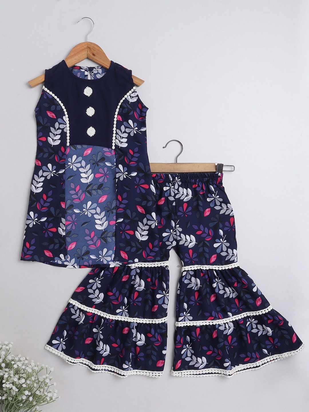 The Magic Wand Girls Navy Blue & Red Floral Printed High Slit Cotton Kurta With Sharara
The Magic Wand Girls Navy Blue & Red Floral Printed High Slit Cotton Kurta With Sharara