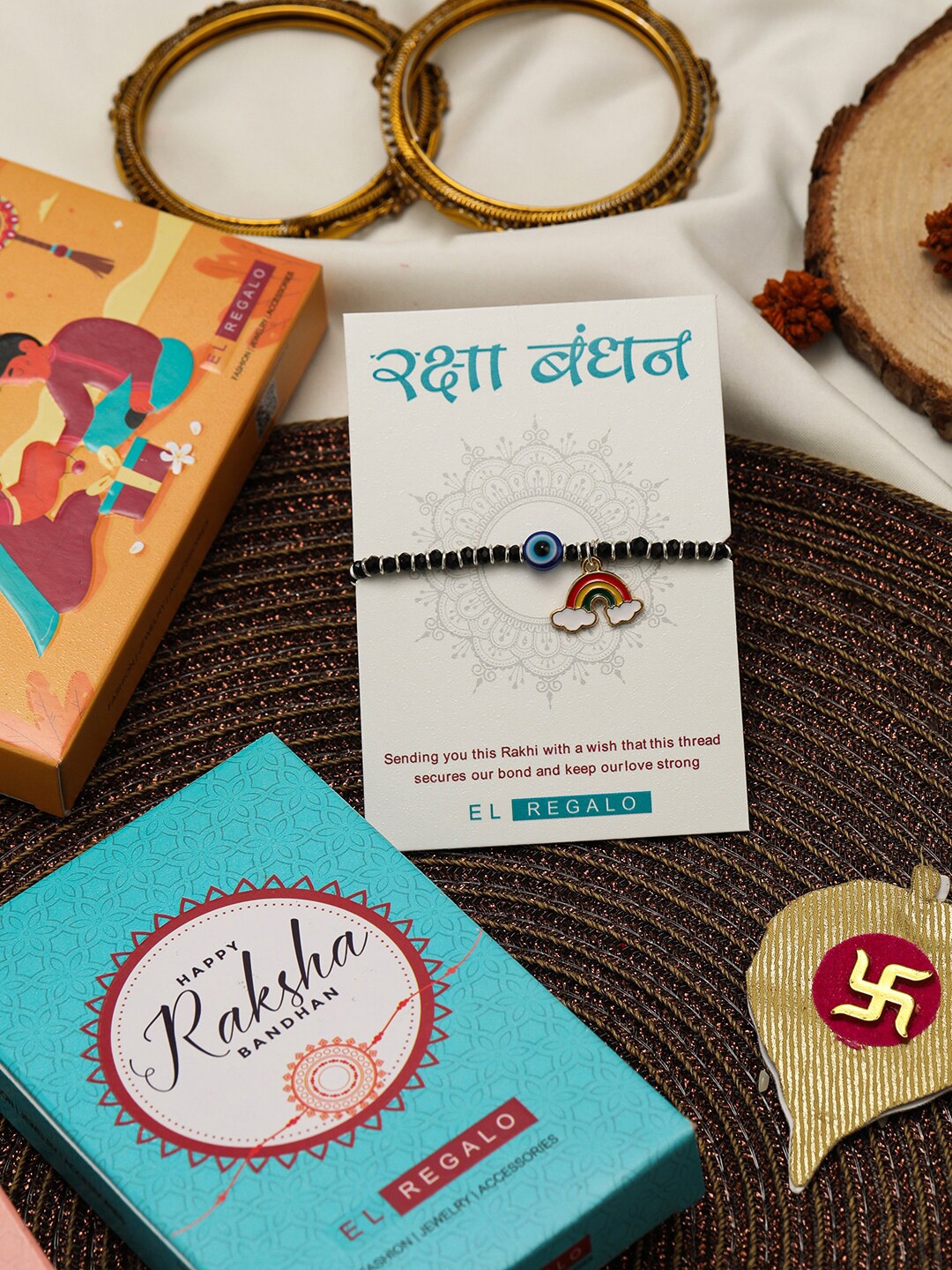 EL REGALO Kids Evil Eye Rainbow Najariya Rakhi With Roli Chawl & Card Gift Set Box, Black
EL REGALO Kids Evil Eye Rainbow Najariya Rakhi With Roli Chawl & Card Gift Set Box, Black