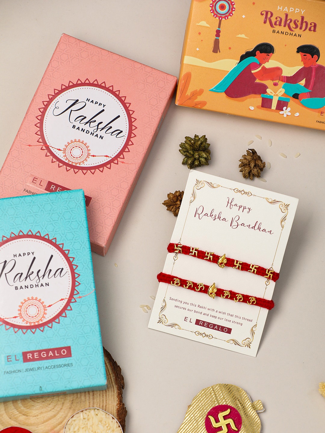 EL REGALO Set Of 2 Ganesha, Om & Sathi Thread Rakhi With Roli Chawal & Greeting Card, Gold
EL REGALO Set Of 2 Ganesha, Om & Sathi Thread Rakhi With Roli Chawal & Greeting Card, Gold