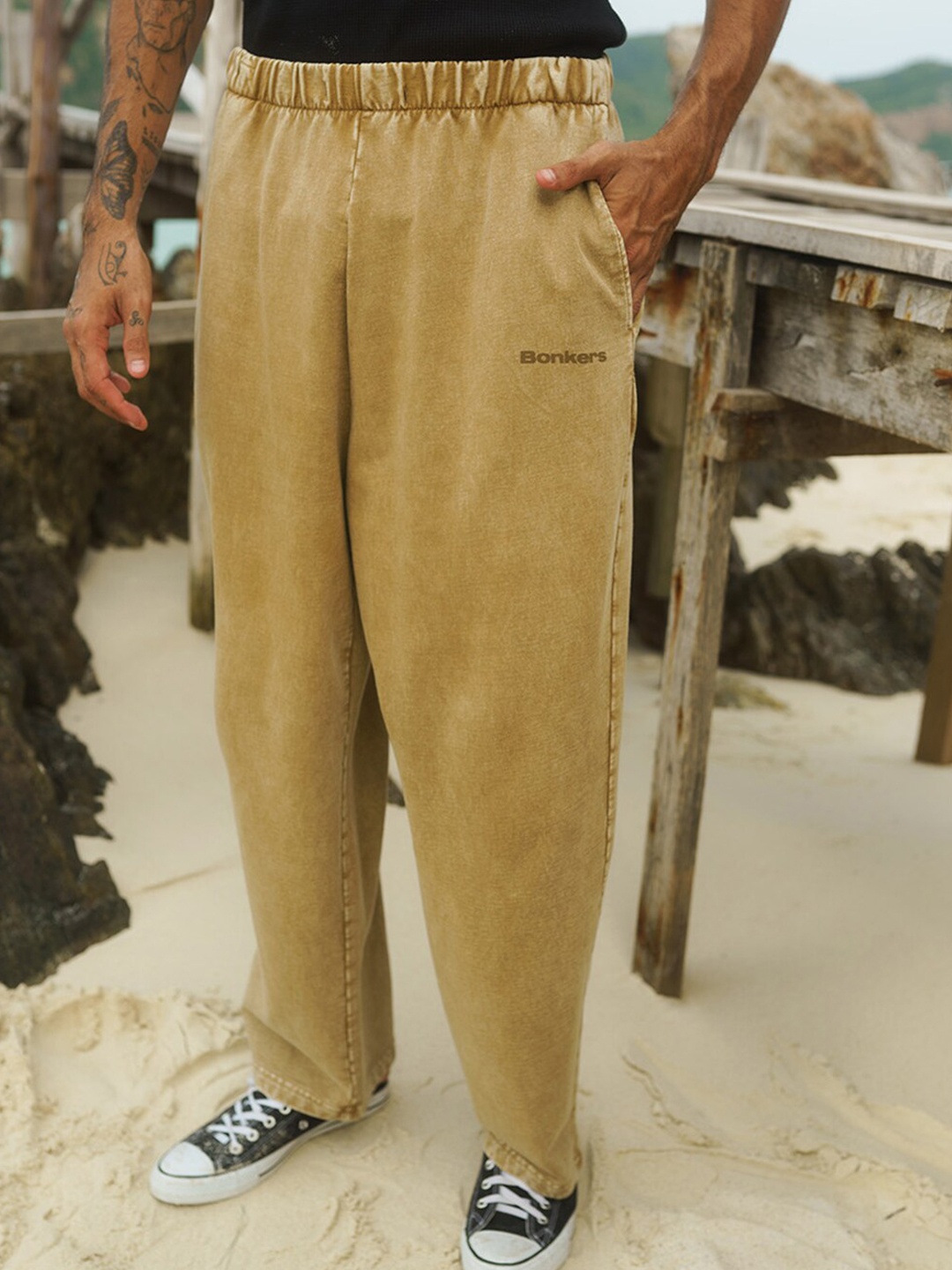 Bonkers Corner Men Mid-Rise Loose Fit Self Designed Casual Cotton Track Pants, Beige
Bonkers Corner Men Mid-Rise Loose Fit Self Designed Casual Cotton Track Pants, Beige