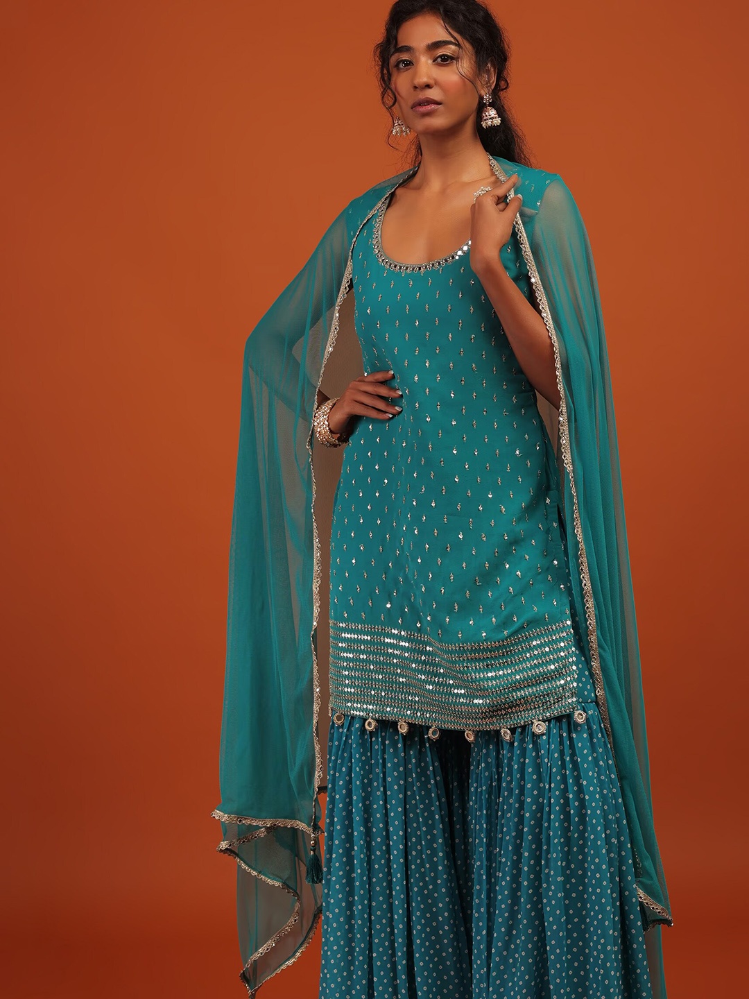 KALKI Fashion Ethnic Motifs Embroidered Regular Sequinned Kurti With Sharara & Dupatta, Blue
KALKI Fashion Ethnic Motifs Embroidered Regular Sequinned Kurti With Sharara & Dupatta, Blue