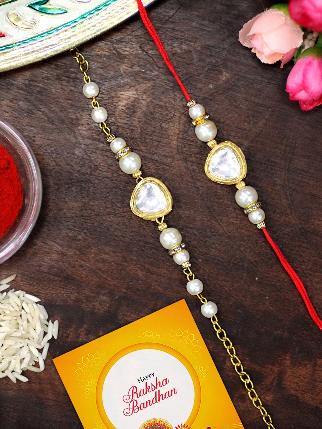 KARATCART Set of 2 Gold-Plated Rakhi For Bhaiya & Bhabhi With Roli Chawal & Greeting Card
KARATCART Set of 2 Gold-Plated Rakhi For Bhaiya & Bhabhi With Roli Chawal & Greeting Card