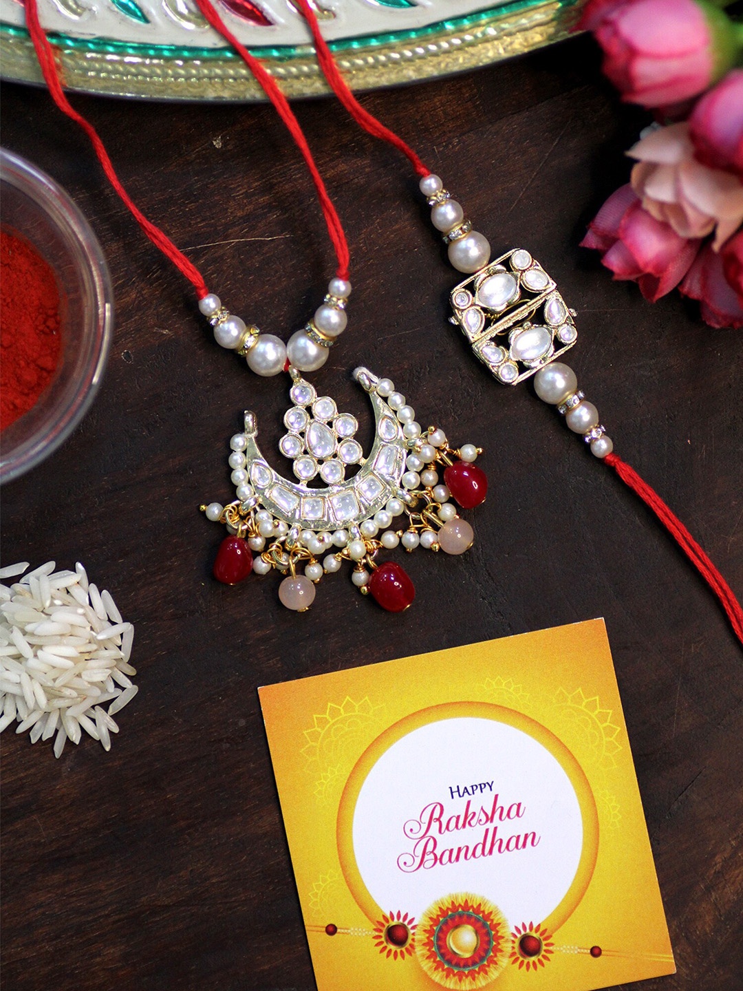 KARATCART Set of 2 Gold-Plated Rakhi For Bhaiya & Bhabhi With Roli Chawal & Greeting Card, Red
KARATCART Set of 2 Gold-Plated Rakhi For Bhaiya & Bhabhi With Roli Chawal & Greeting Card, Red