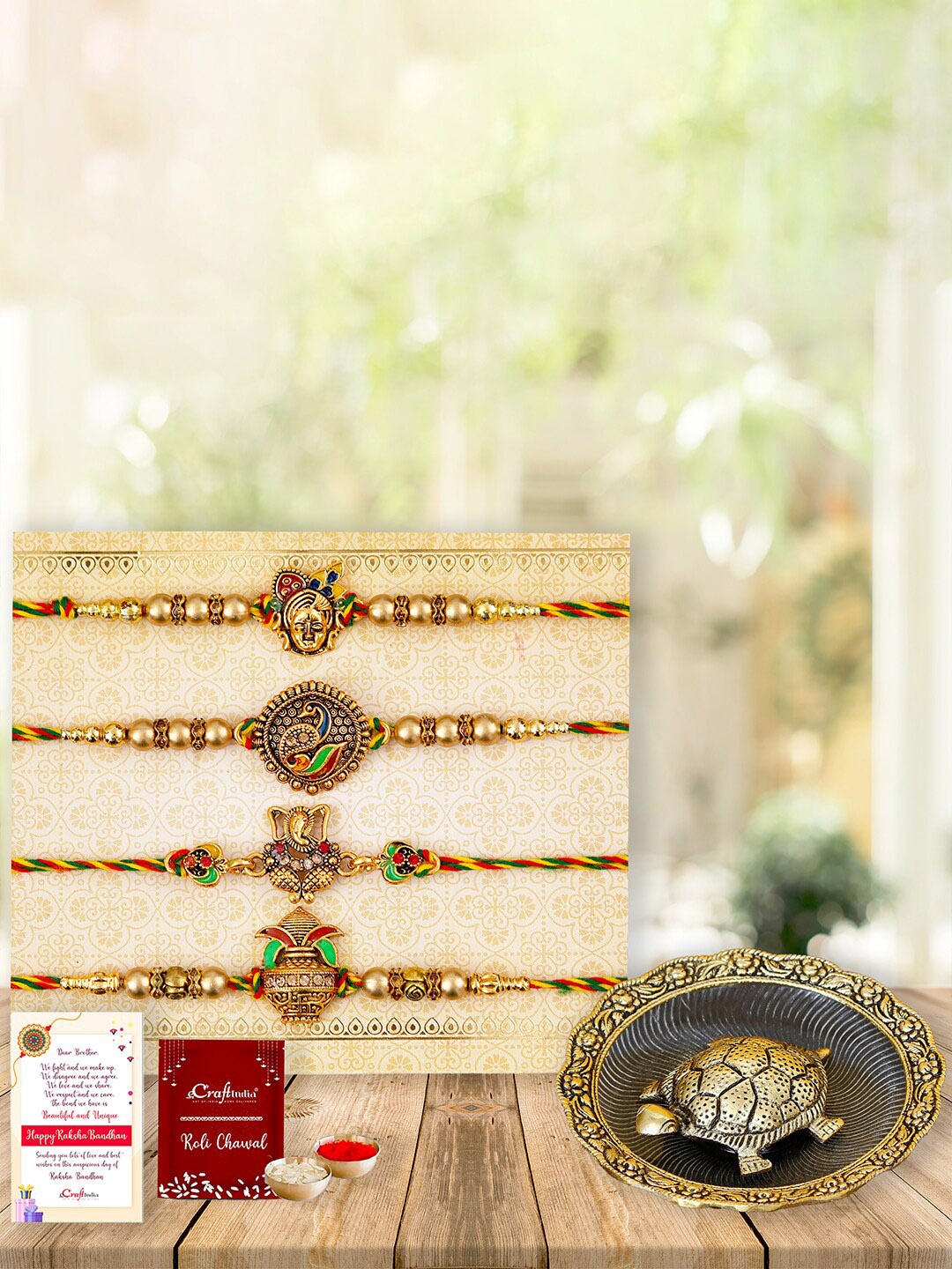 eCraftIndia Set Of 4 Studded Rakhi With Roli Chawal Greeting Card & Tortoise Statue Gift, Gold
eCraftIndia Set Of 4 Studded Rakhi With Roli Chawal Greeting Card & Tortoise Statue Gift, Gold