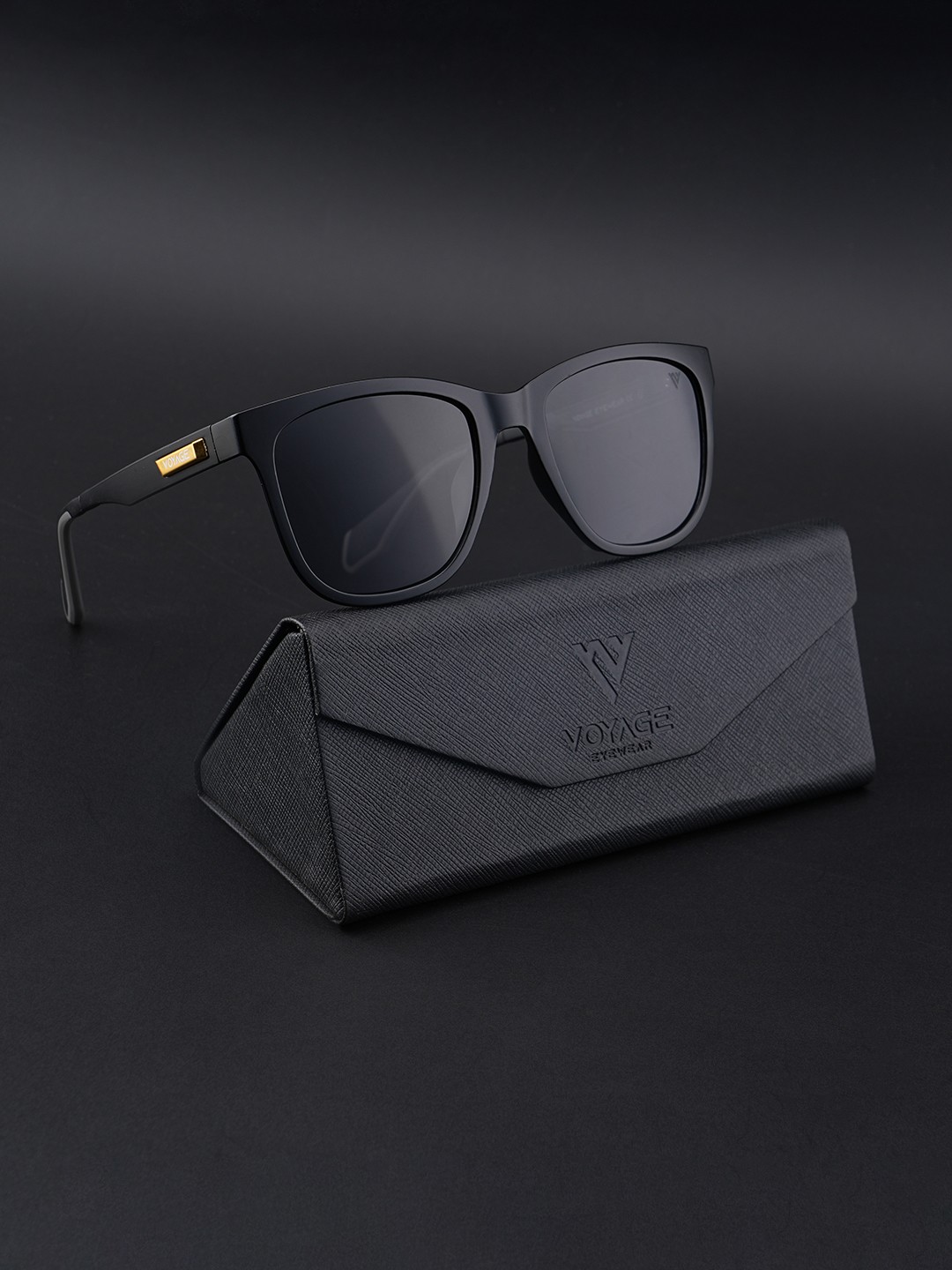 Voyage Unisex Black Lens & Black Wayfarer Sunglasses with Polarised and UV Protected Lens
Voyage Unisex Black Lens & Black Wayfarer Sunglasses with Polarised and UV Protected Lens