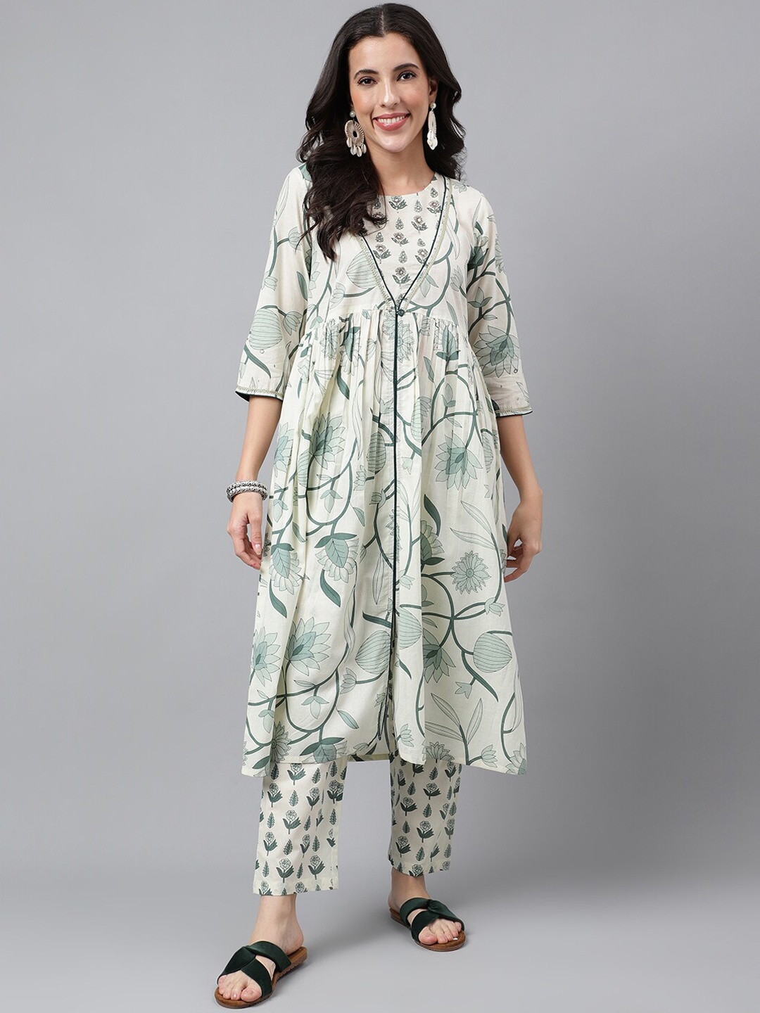FLAMBOYANT Floral Printed Sequinned Pleated Pure Cotton Anarkali Kurta with Trousers, Off white
FLAMBOYANT Floral Printed Sequinned Pleated Pure Cotton Anarkali Kurta with Trousers, Off white