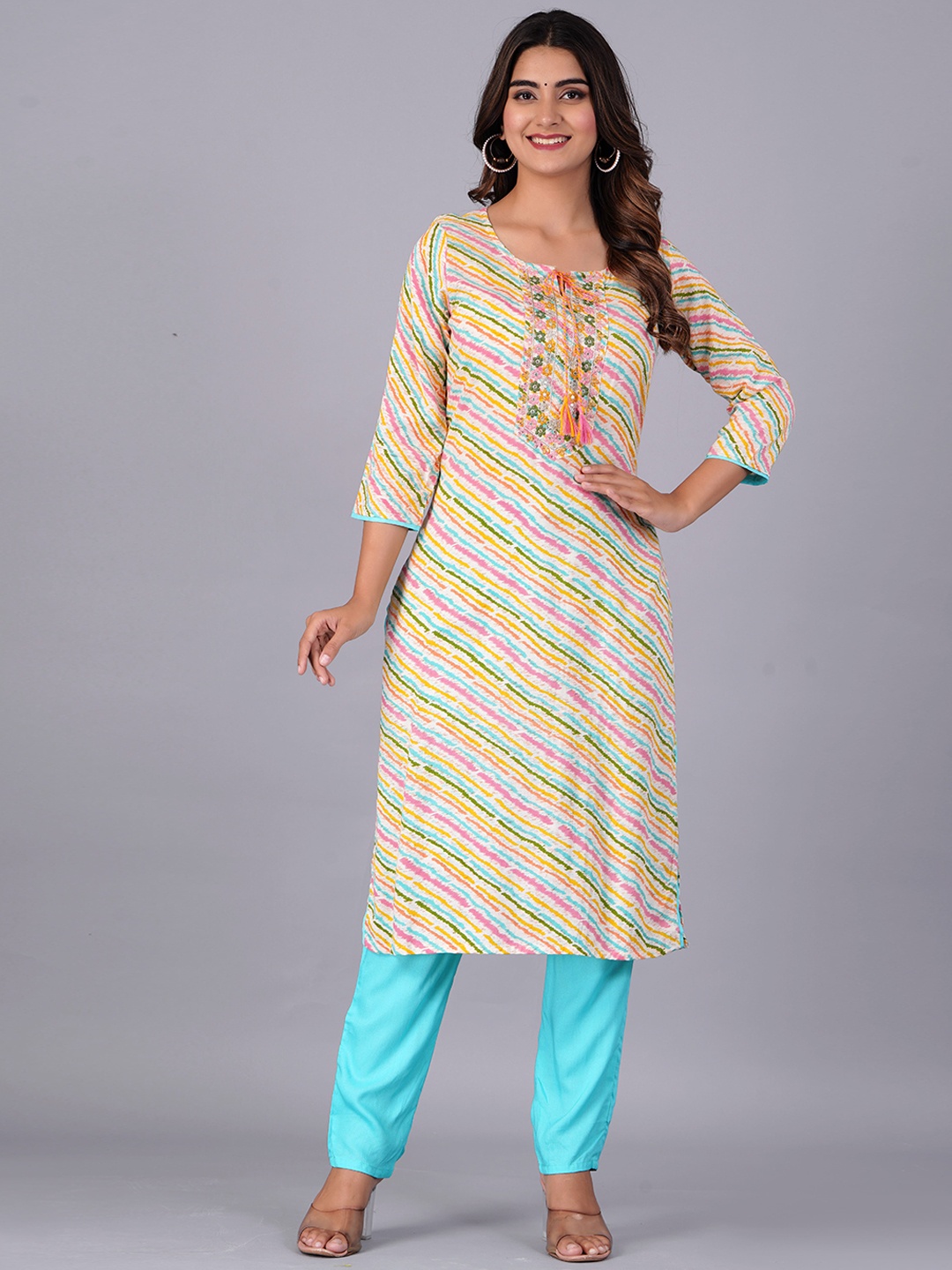 KALINI Lehariya Printed Thread Work Detailed Rayon Kurta with Trousers & With Dupatta, Off white
KALINI Lehariya Printed Thread Work Detailed Rayon Kurta with Trousers & With Dupatta, Off white