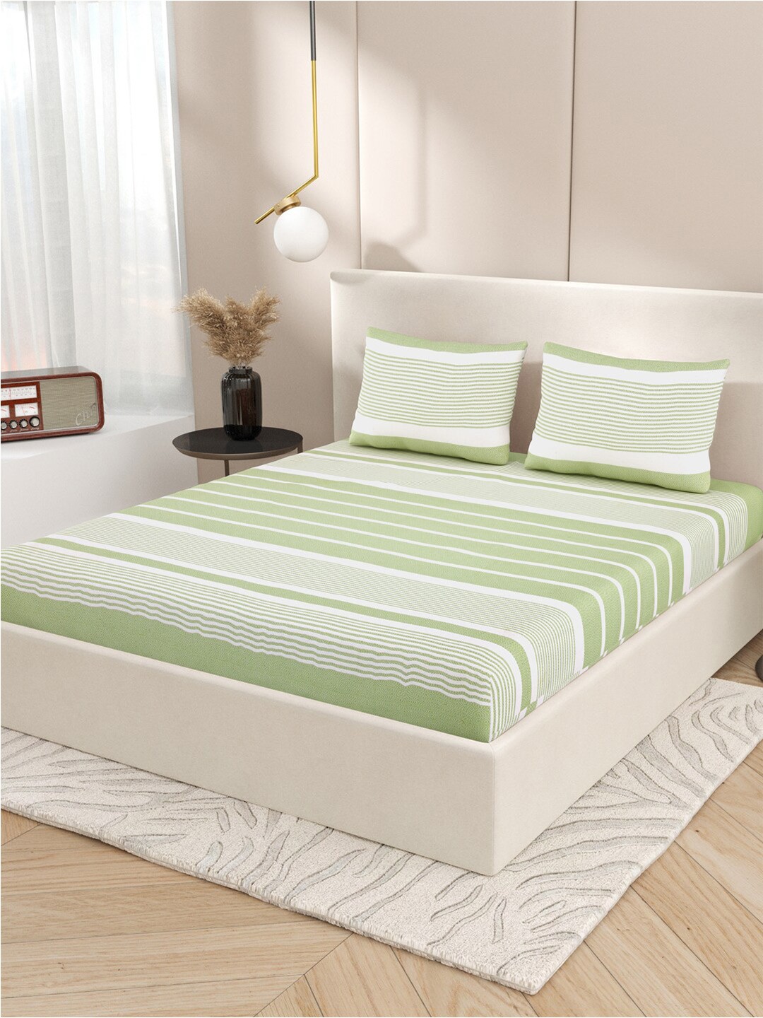 Varde All Seasons Green & White Striped Cotton 210 TC King Bedsheet with 2 Pillow Covers
Varde All Seasons Green & White Striped Cotton 210 TC King Bedsheet with 2 Pillow Covers