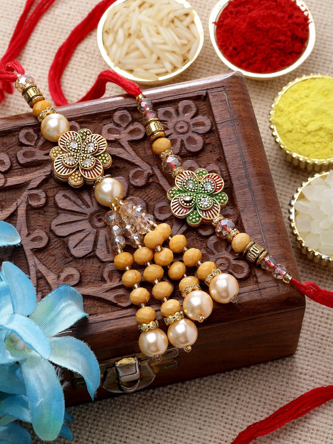 ZENEME Unisex Set of 2 Kundan & Beads Bhaiya Bhabhi Rakhi With Roli Chawal, Gold
ZENEME Unisex Set of 2 Kundan & Beads Bhaiya Bhabhi Rakhi With Roli Chawal, Gold
