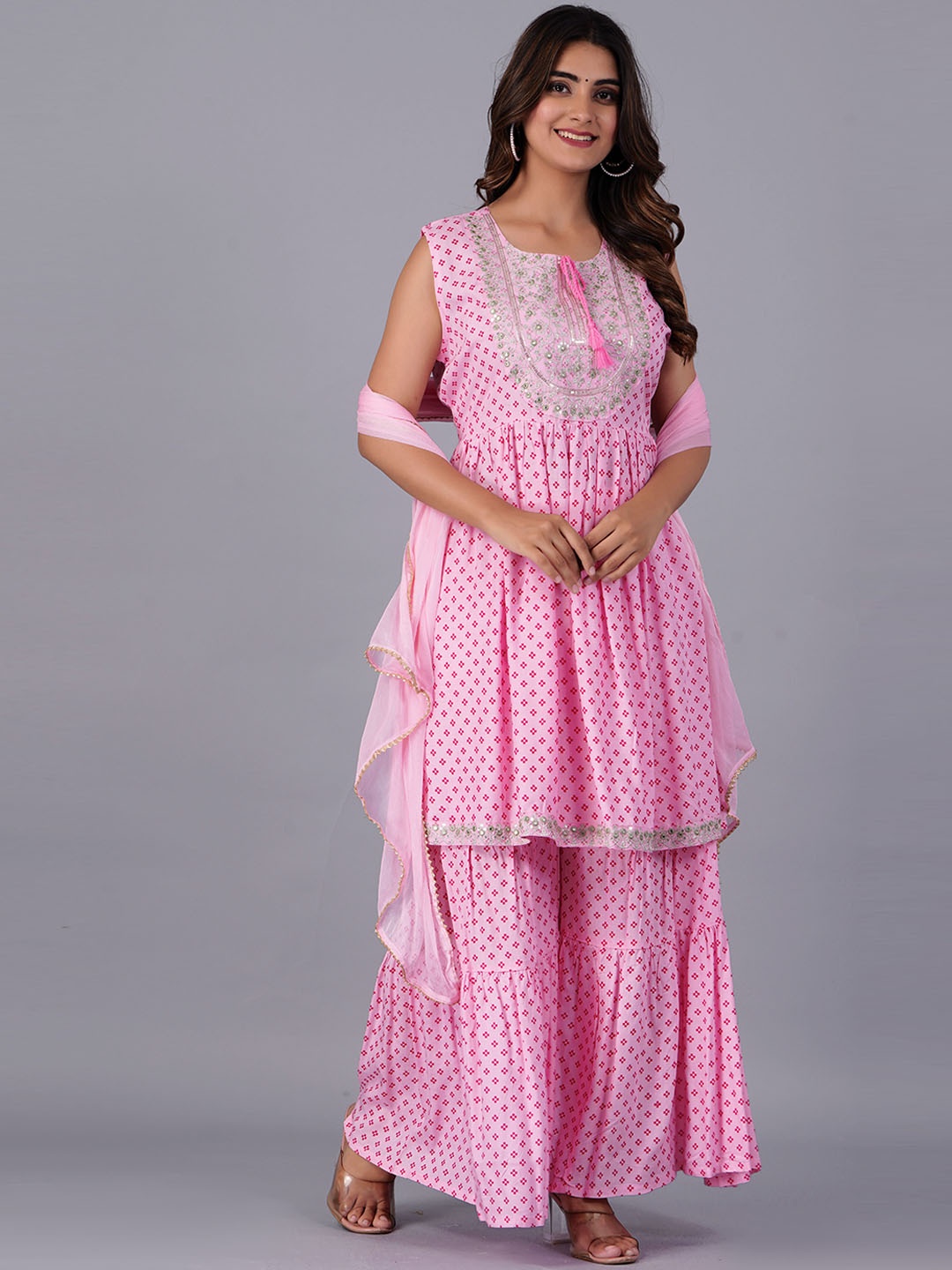 KALINI Floral Printed Mirror Work Pleated Anarkali Kurta With Sharara & Dupatta, Pink
KALINI Floral Printed Mirror Work Pleated Anarkali Kurta With Sharara & Dupatta, Pink