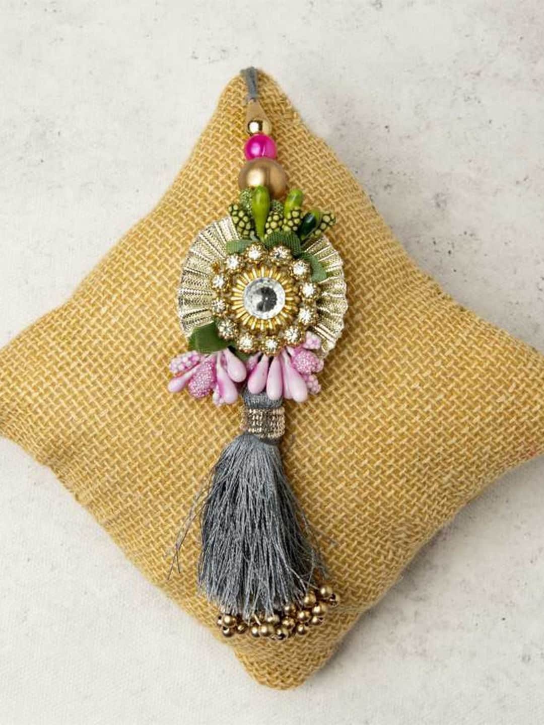 eCraftIndia Unisex Set Of 2 Floral Bhaiya Bhabhi Thread Rakhi Set With Roli Chawal Pack, Grey
eCraftIndia Unisex Set Of 2 Floral Bhaiya Bhabhi Thread Rakhi Set With Roli Chawal Pack, Grey