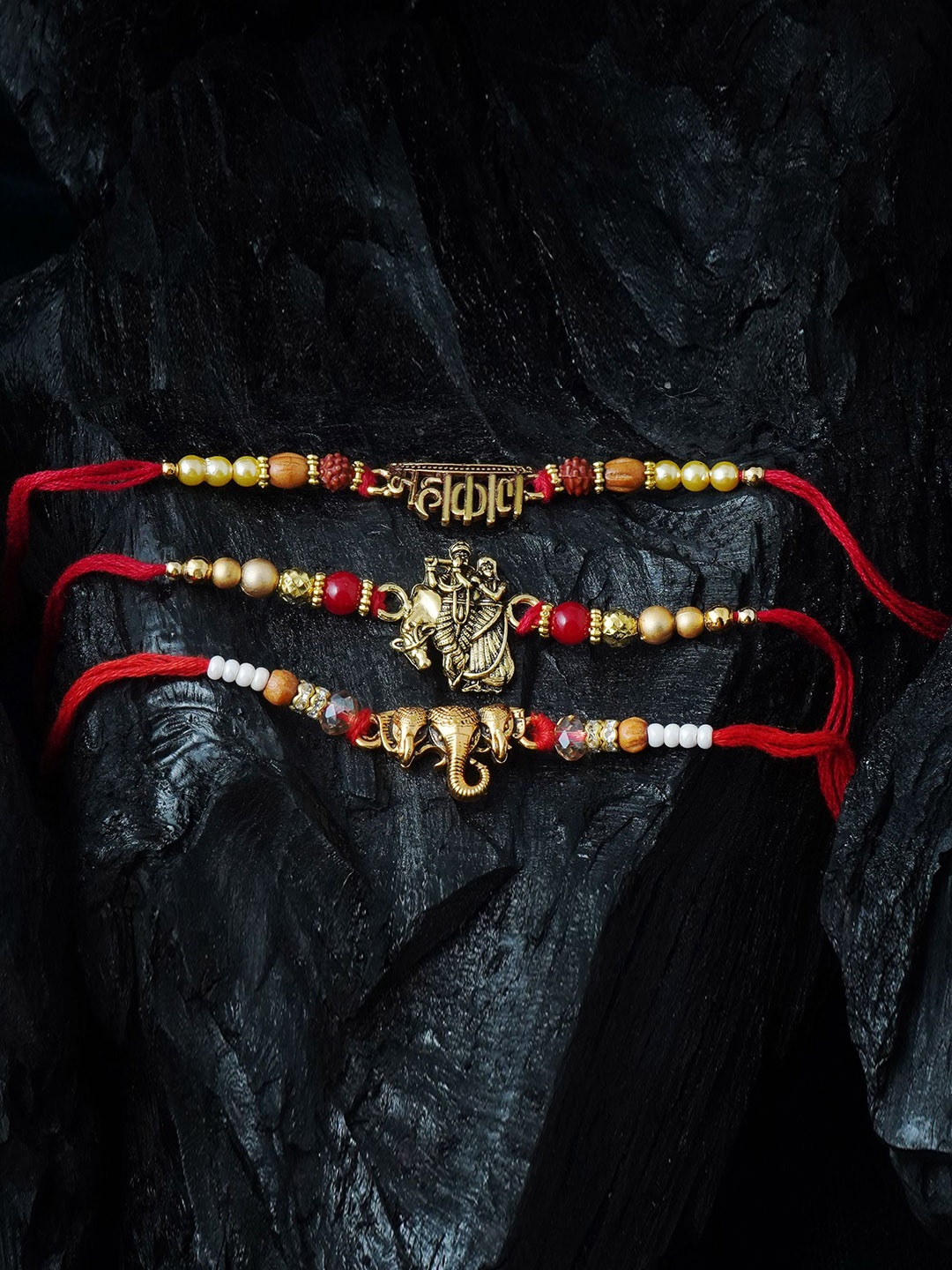 MANSIYAORANGE Men Set Of 3 Pearl & Radha Krishna Elephant & Mahakal Charm Cotton Rakhis, Red
MANSIYAORANGE Men Set Of 3 Pearl & Radha Krishna Elephant & Mahakal Charm Cotton Rakhis, Red