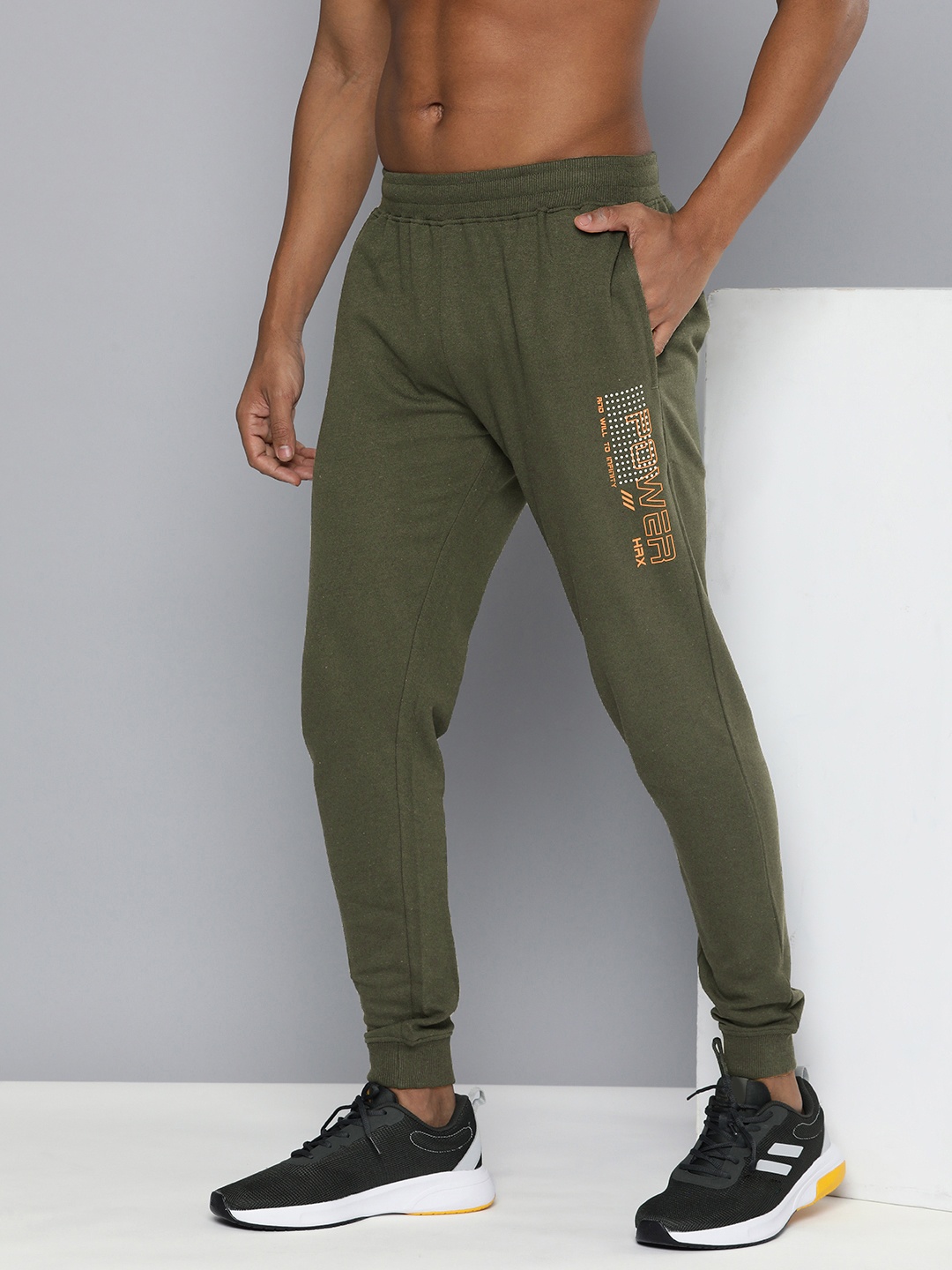 HRX by Hrithik Roshan Men Lifestyle Graphic Printed Regular Fit Joggers, Olive
HRX by Hrithik Roshan Men Lifestyle Graphic Printed Regular Fit Joggers, Olive
