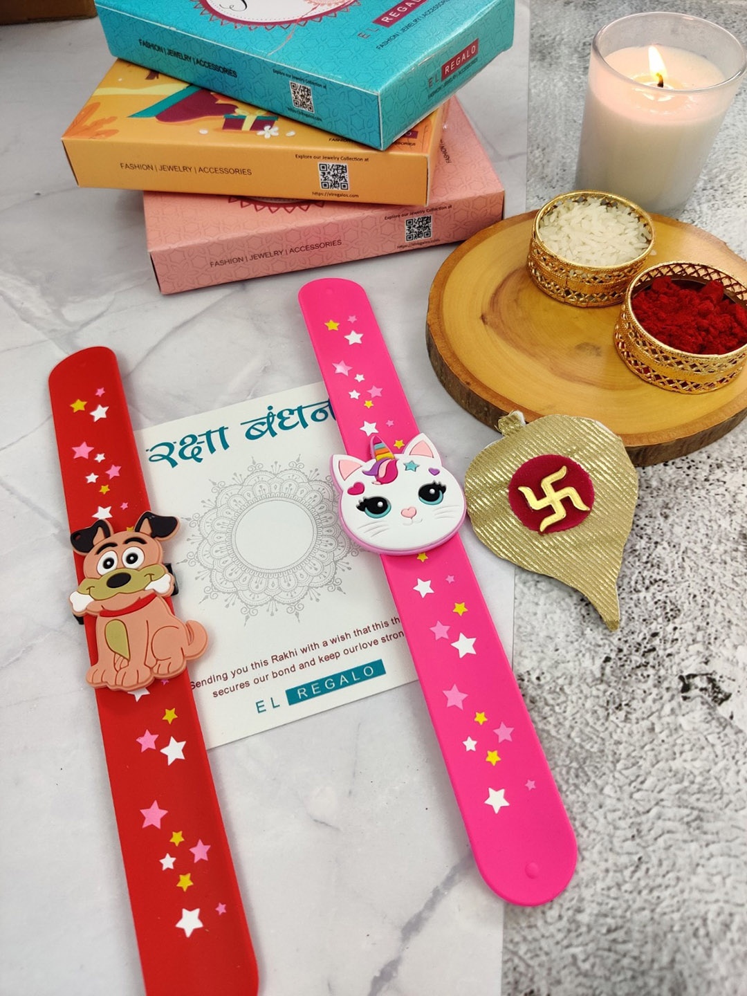 EL REGALO Kids Set Of 2 Dog & Cat Design Slap Band Rakhi With Roli Chawl & Card Gift Set, Red
EL REGALO Kids Set Of 2 Dog & Cat Design Slap Band Rakhi With Roli Chawl & Card Gift Set, Red