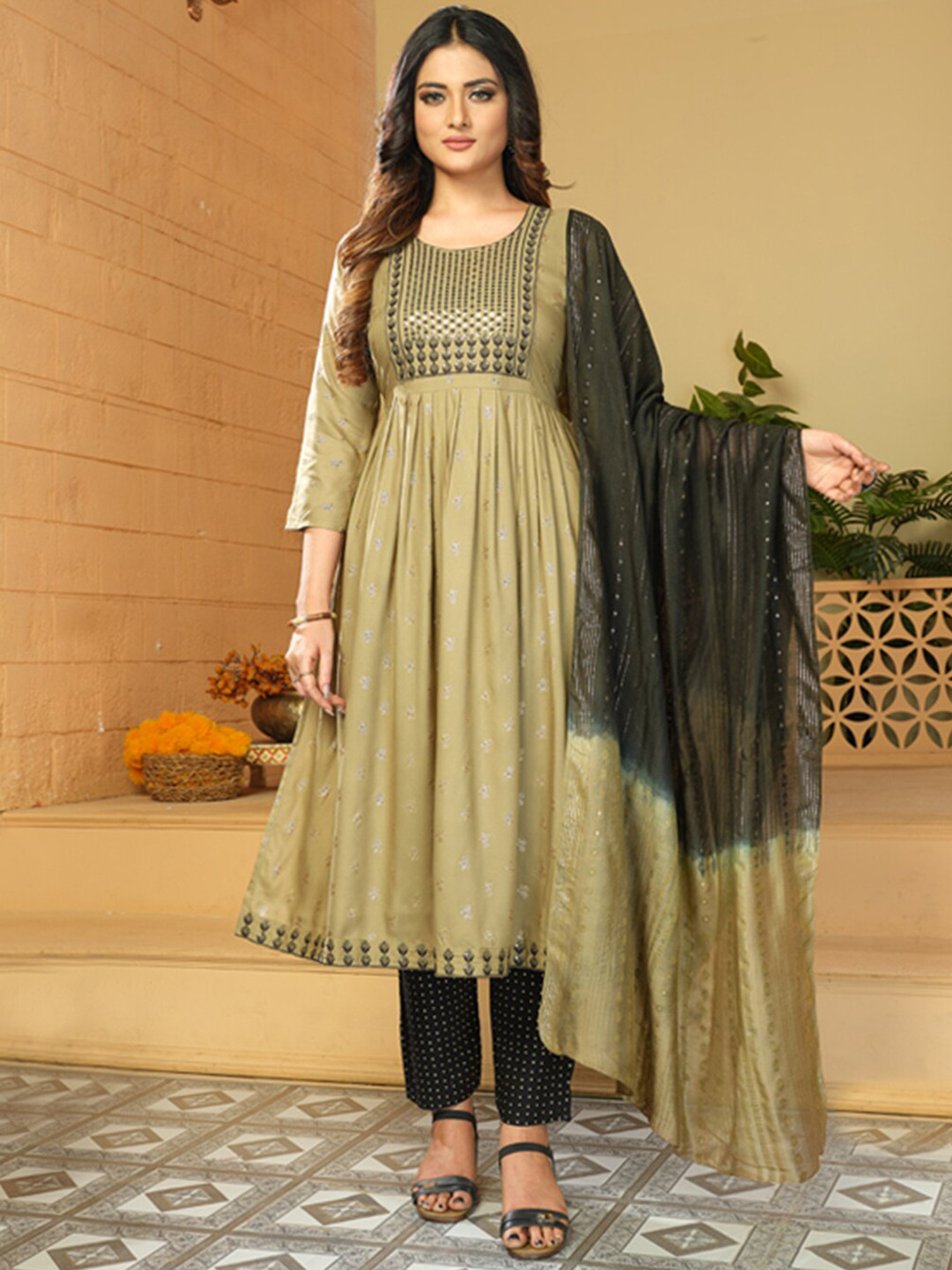 KALINI Ethnic Motifs Printed Thread Work A-Line Kurta with Trousers And Dupatta, Brown
KALINI Ethnic Motifs Printed Thread Work A-Line Kurta with Trousers And Dupatta, Brown