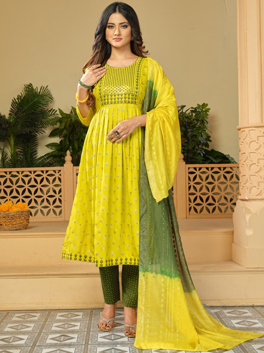 KALINI Ethnic Motifs Printed Thread Work A-Line Kurta with Trousers And Dupatta, Yellow
KALINI Ethnic Motifs Printed Thread Work A-Line Kurta with Trousers And Dupatta, Yellow