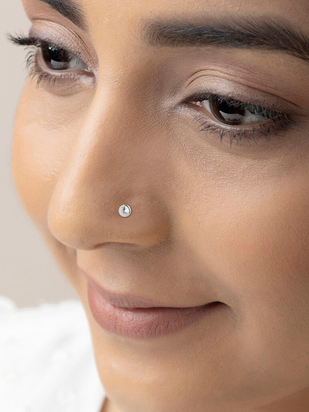 March by FableStreet 925 Sterling Silver Rhodium Plated & Zircon Studded Nosepin
March by FableStreet 925 Sterling Silver Rhodium Plated & Zircon Studded Nosepin