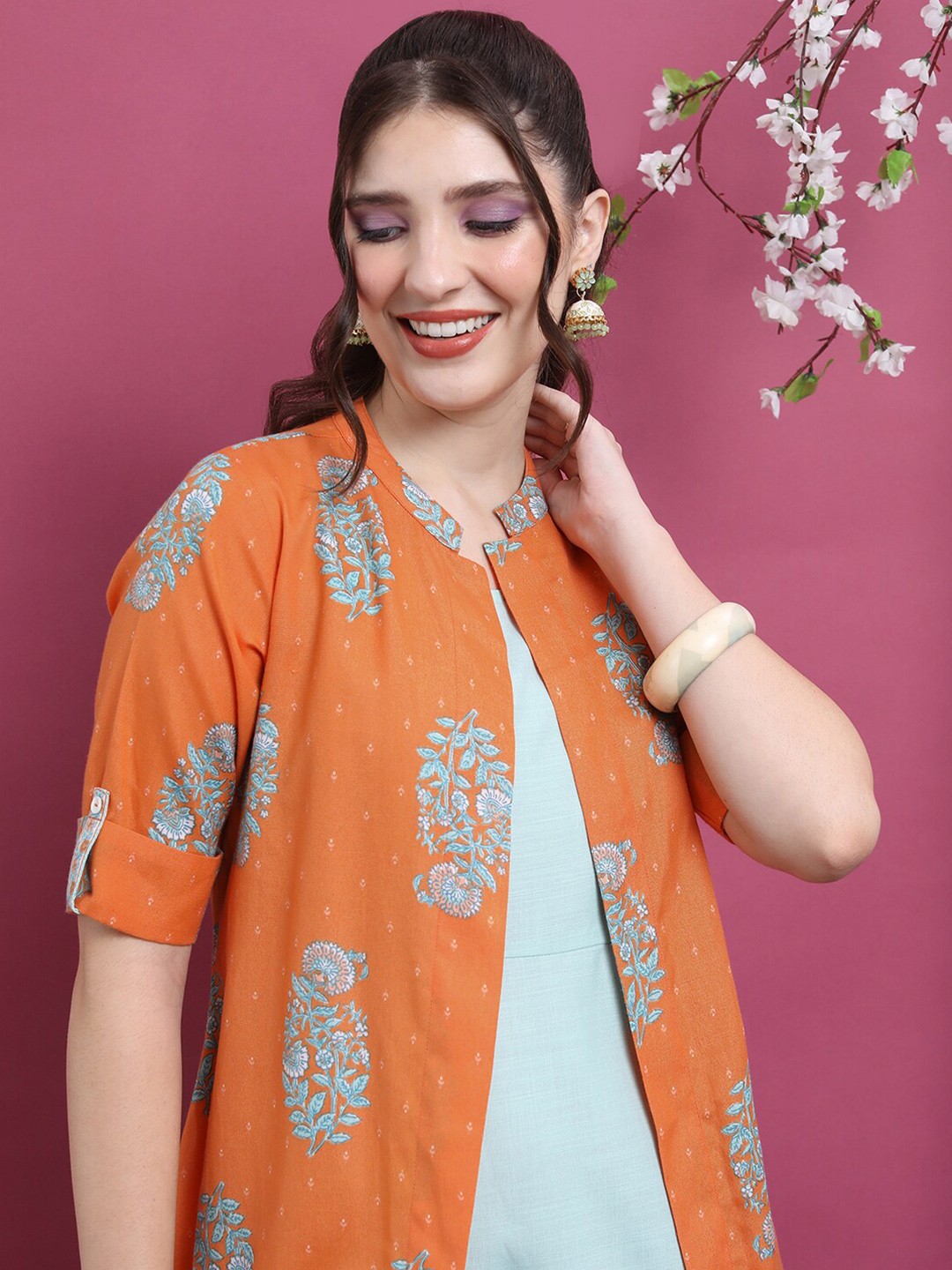 Vishudh Peach-Coloured Ethnic Motifs Printed A-Line Maxi Ethnic Dress With Long Overlay
Vishudh Peach-Coloured Ethnic Motifs Printed A-Line Maxi Ethnic Dress With Long Overlay