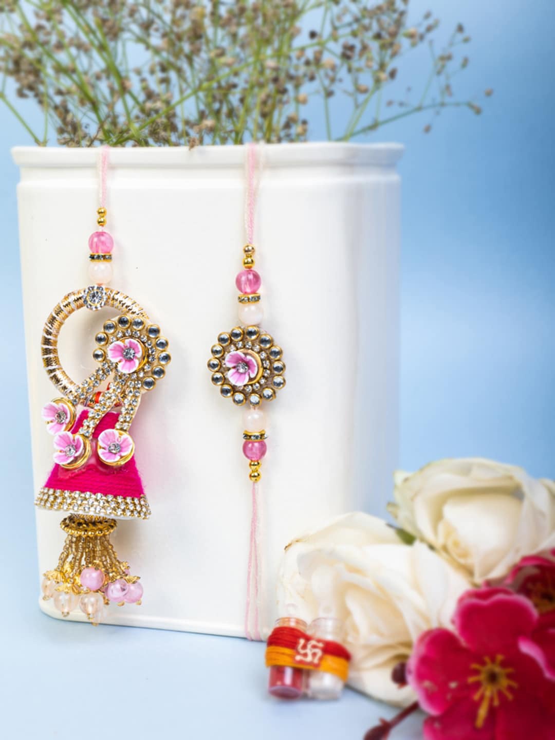 PANASH Unisex Set Of 2 Gold-Plated Floral Bhaiya Bhabhi Embellished Rakhi With Roli Chawal
PANASH Unisex Set Of 2 Gold-Plated Floral Bhaiya Bhabhi Embellished Rakhi With Roli Chawal