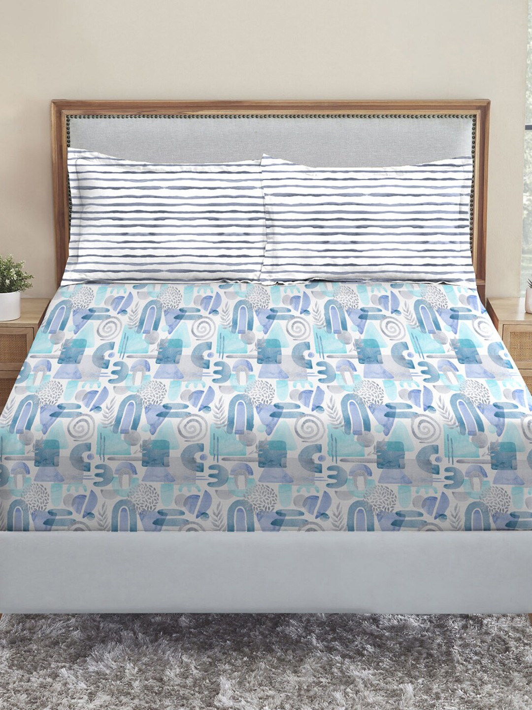 MYTRIDENT Dusk and Dawn Blue White Geometric Cotton 144TC Queen Bedsheet 2 Pillow Covers
MYTRIDENT Dusk and Dawn Blue White Geometric Cotton 144TC Queen Bedsheet 2 Pillow Covers