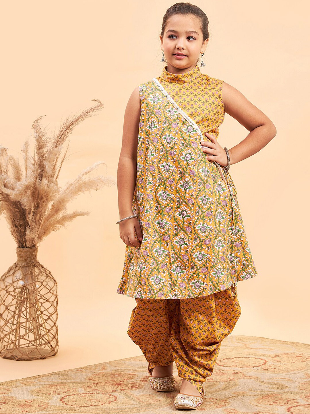 Stylo Bug Girls Ethnic Motifs Printed Angrakha Pure Cotton Kurta With Dhoti Pants, Yellow
Stylo Bug Girls Ethnic Motifs Printed Angrakha Pure Cotton Kurta With Dhoti Pants, Yellow