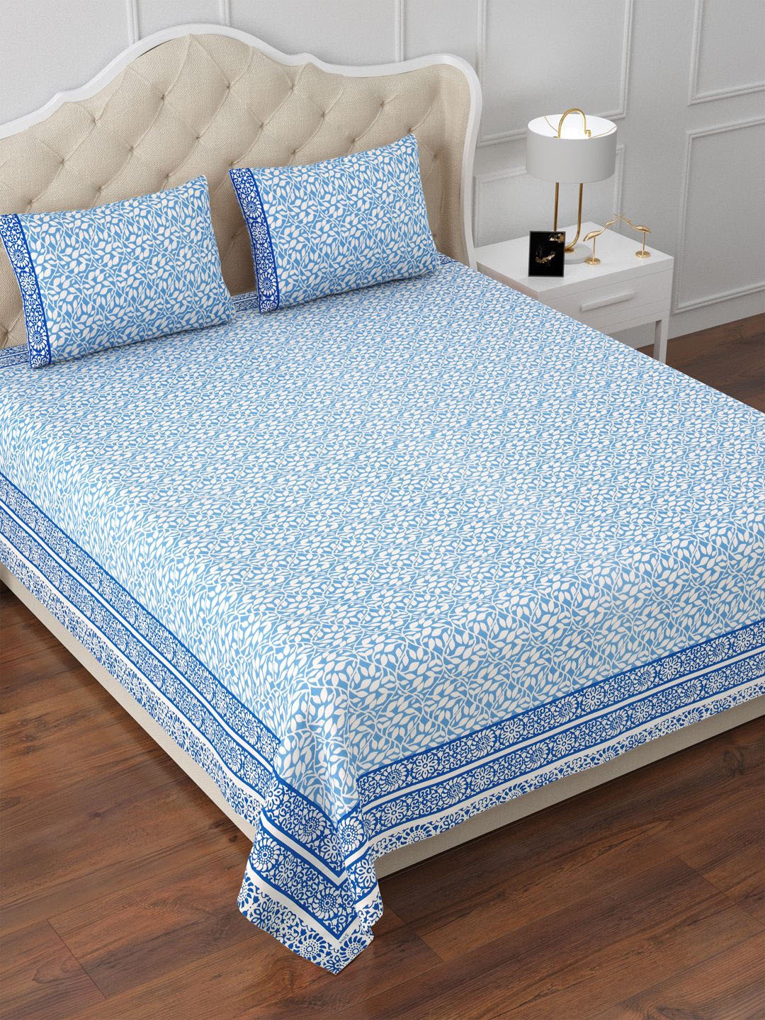Aapno Rajasthan Blue & White Floral Cotton 144 TC King Bedsheet With 2 Pillow Covers
Aapno Rajasthan Blue & White Floral Cotton 144 TC King Bedsheet With 2 Pillow Covers