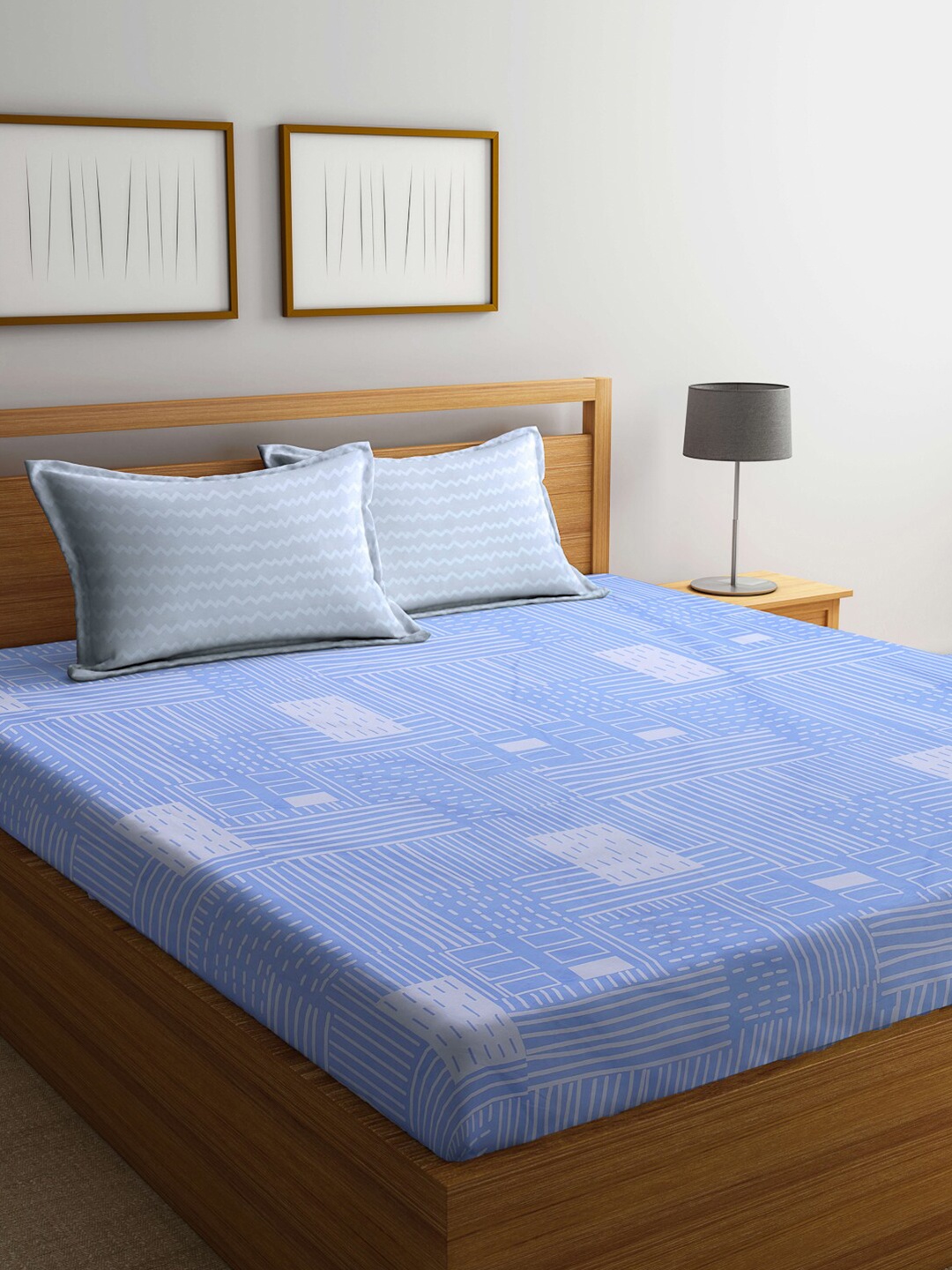 KLOTTHE Blue & White Geometric Printed Cotton Blend 300 TC King Bedsheet & 2 Pillow Covers
KLOTTHE Blue & White Geometric Printed Cotton Blend 300 TC King Bedsheet & 2 Pillow Covers
