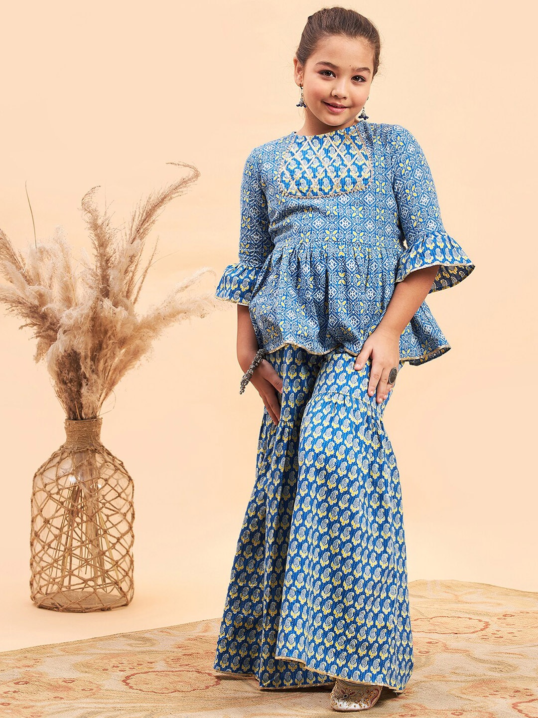 Stylo Bug Girls Ethnic Motifs Printed Bell Sleeves Pure Cotton Kurti with Sharara, Blue
Stylo Bug Girls Ethnic Motifs Printed Bell Sleeves Pure Cotton Kurti with Sharara, Blue
