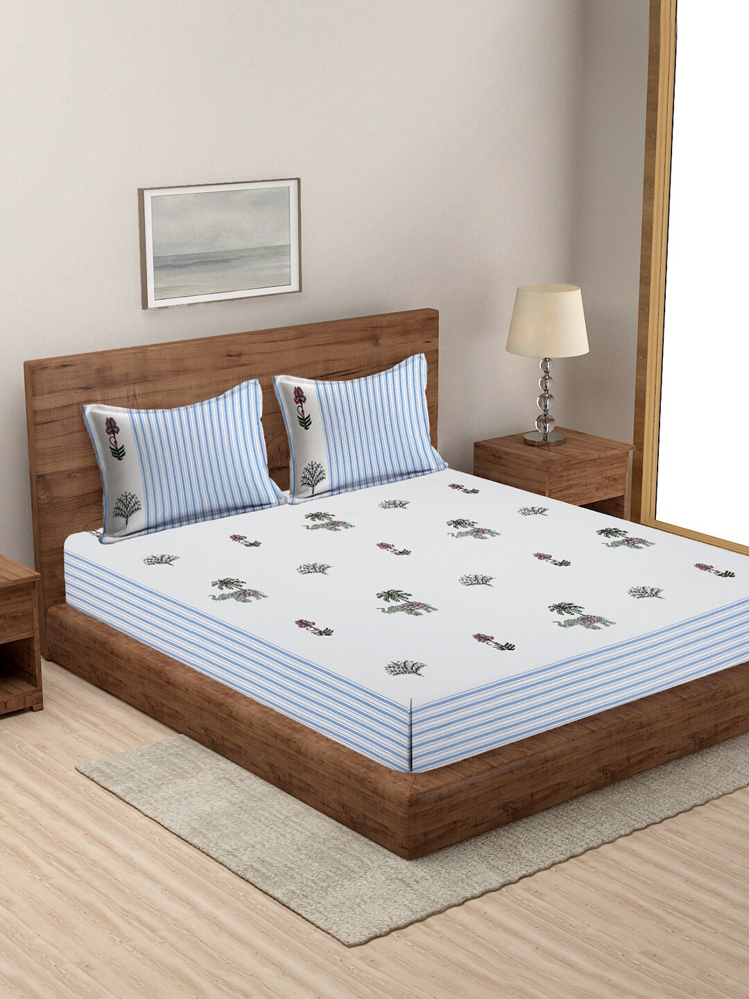 Rajasthan Decor White & Blue Printed Cotton 160 TC King Bedsheet with 2 Pillow Covers
Rajasthan Decor White & Blue Printed Cotton 160 TC King Bedsheet with 2 Pillow Covers